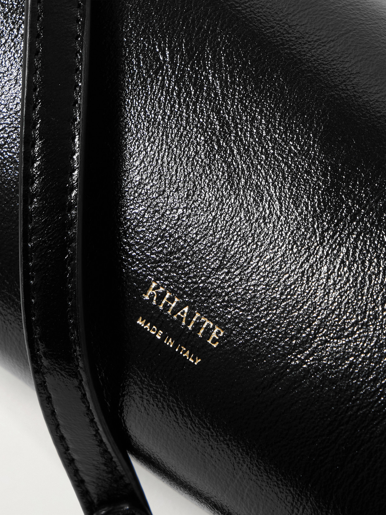 Khaite Kye Glossed-leather Shoulder Bag In Black