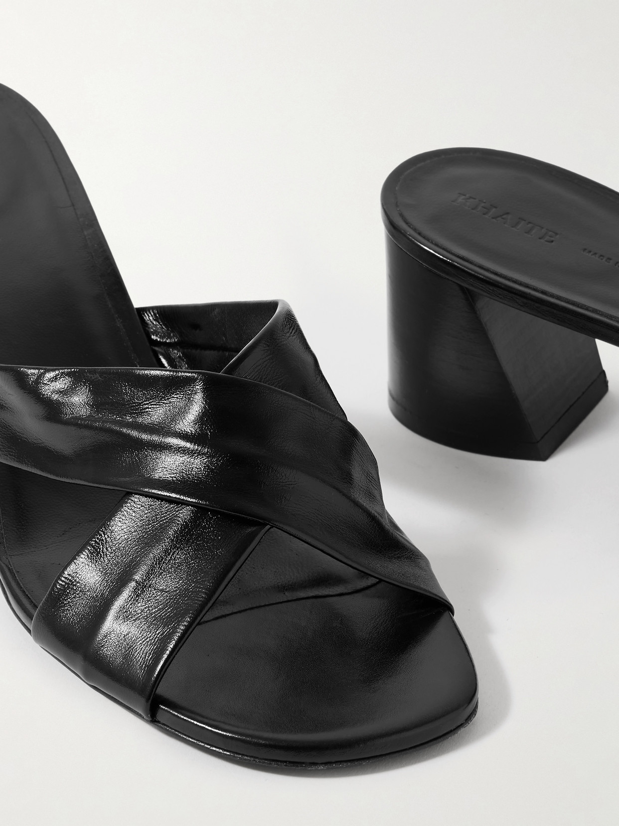 Khaite Liria Glossed-leather Mules In Black