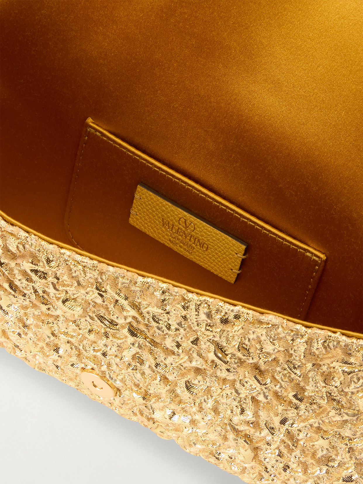 Valentino Garavani Mini Structured Handbag With Signature Detailing In Gold