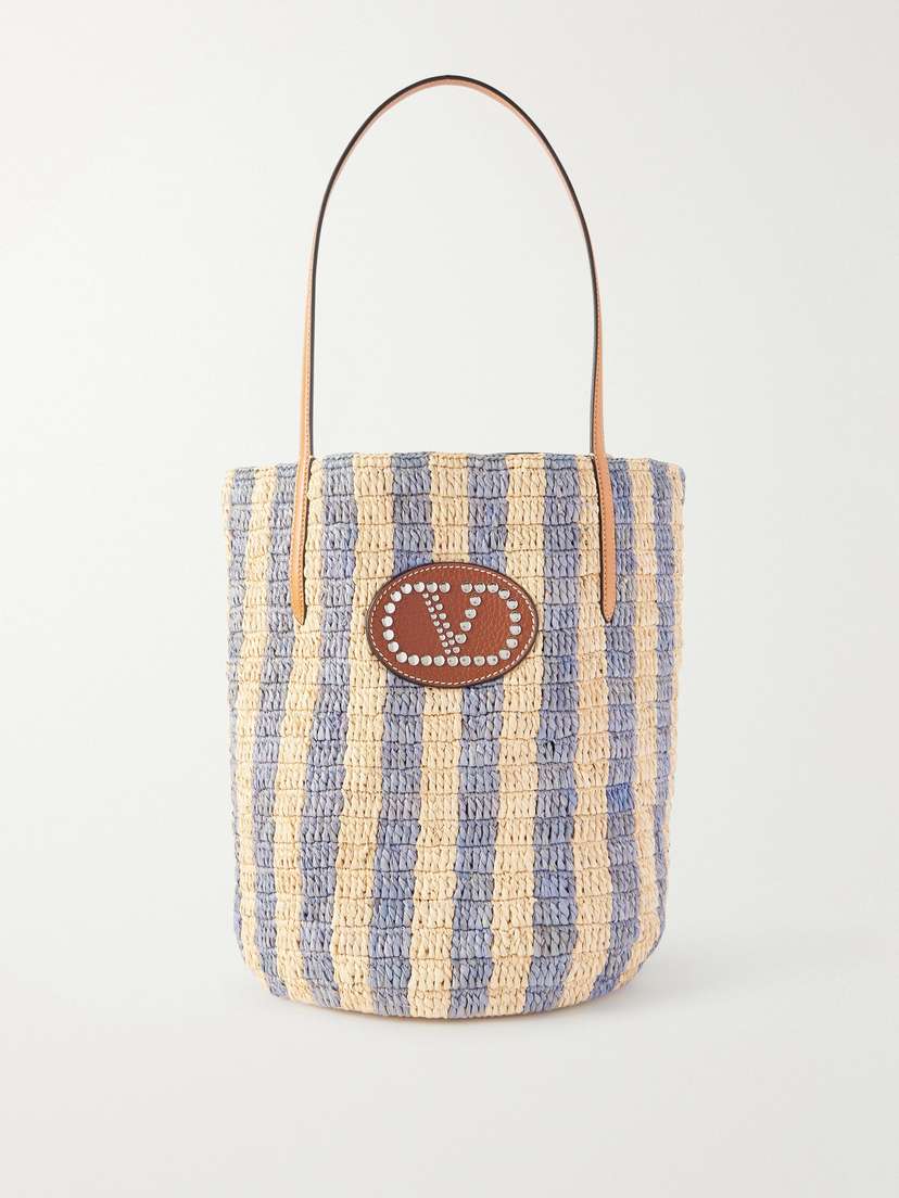 Valentino Garavani — Vlogo Signature small embellished leather-trimmed striped raffia bucket bag
