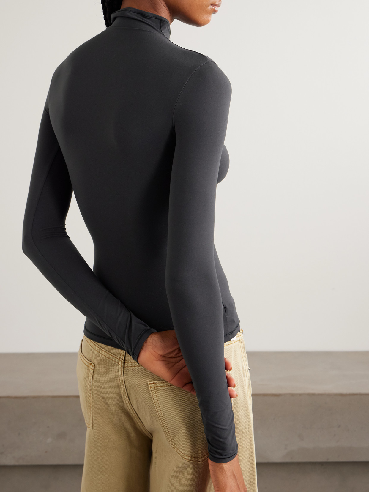 Skims Stretch-jersey Turtleneck Top In Black