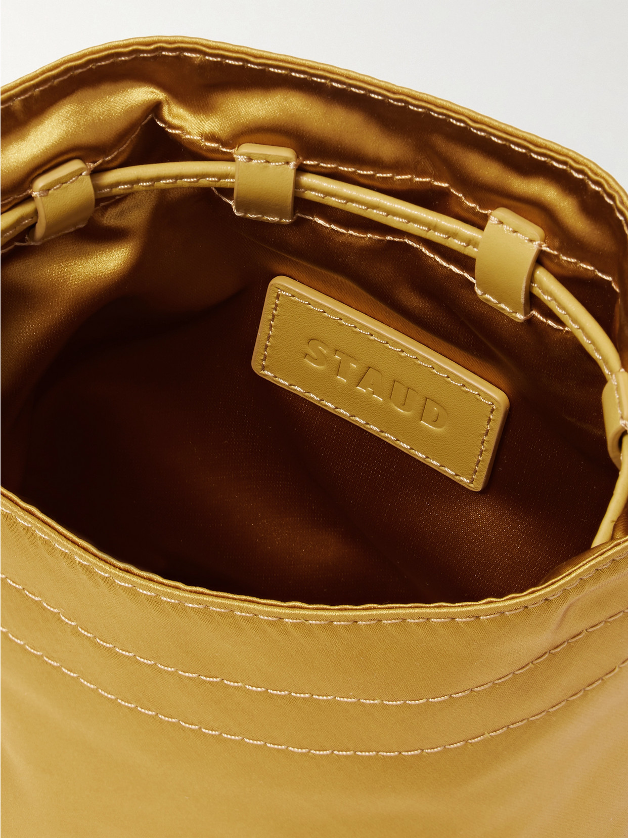 Staud Lila Mini Leather-trimmed Metallic Satin Bucket Bag In Gold