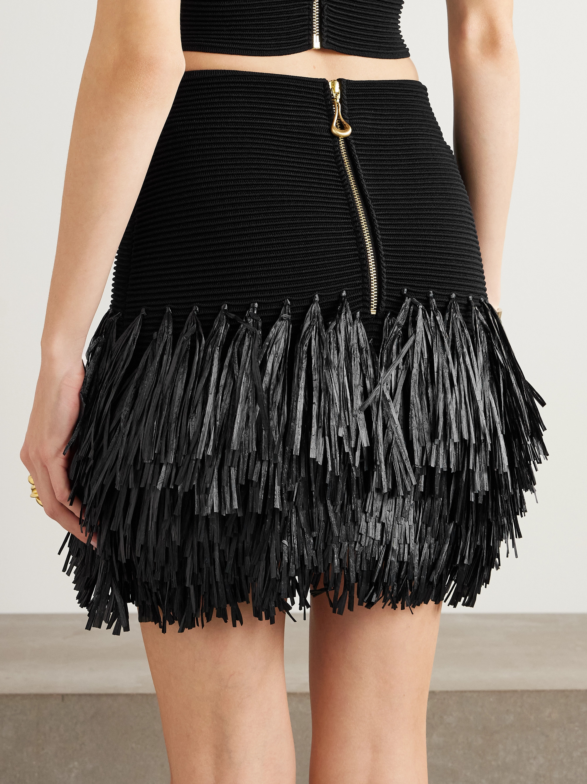 Aje Agave fringed raffia-trimmed ribbed-knit mini skirt thumbnail
