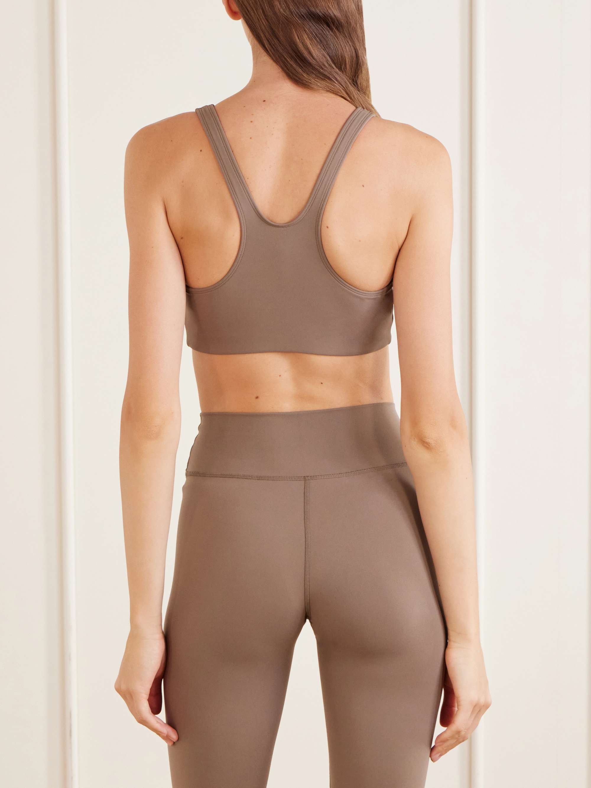 SPORTY & RICH Logo-print stretch-jersey sports bra | NET-A-PORTER