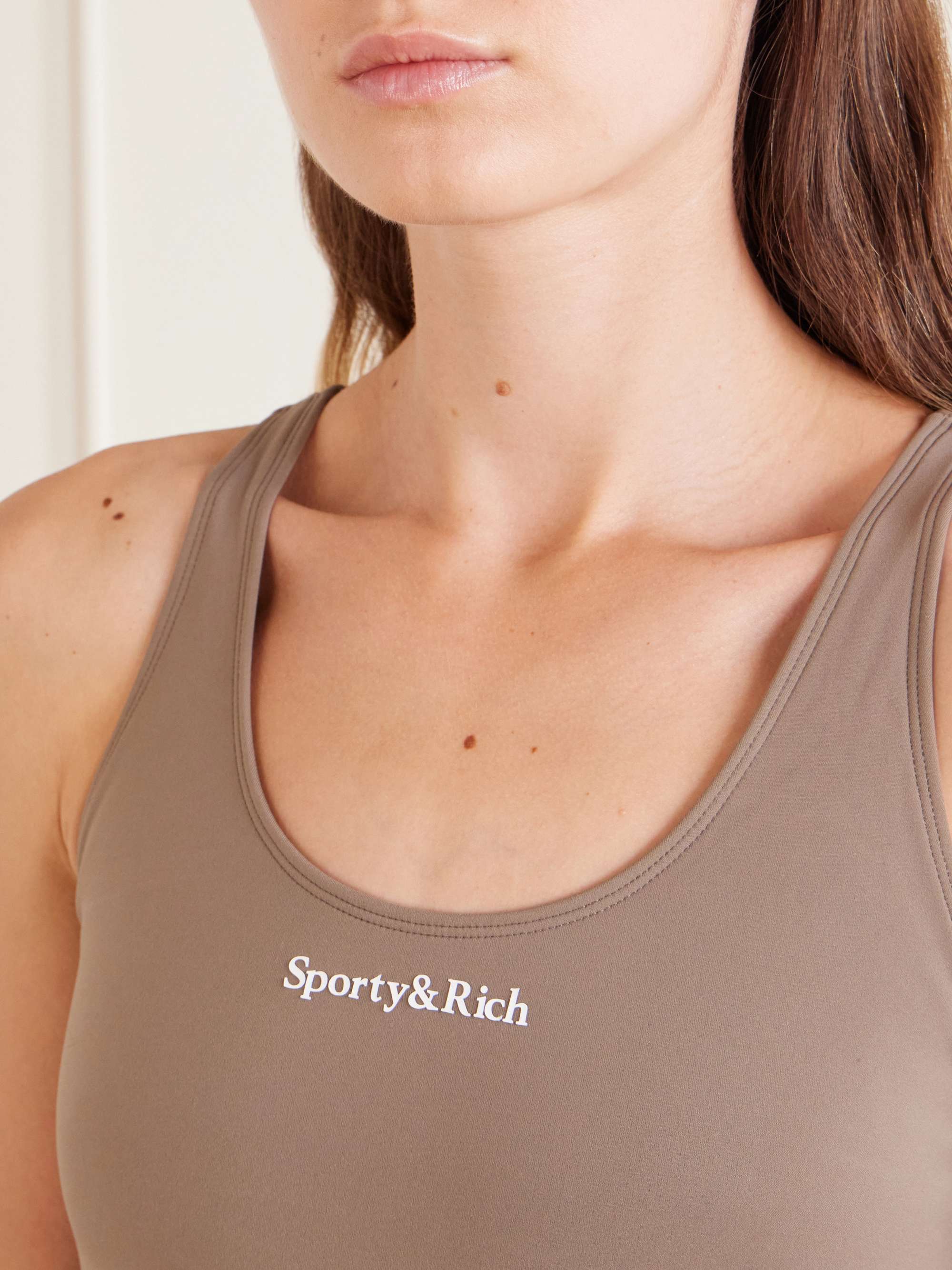 SPORTY & RICH Logo-print stretch-jersey sports bra | NET-A-PORTER