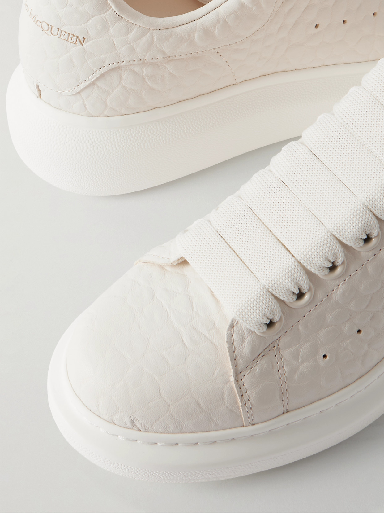 Alexander Mcqueen Textured-leather Exaggerated-sole Sneakers In White