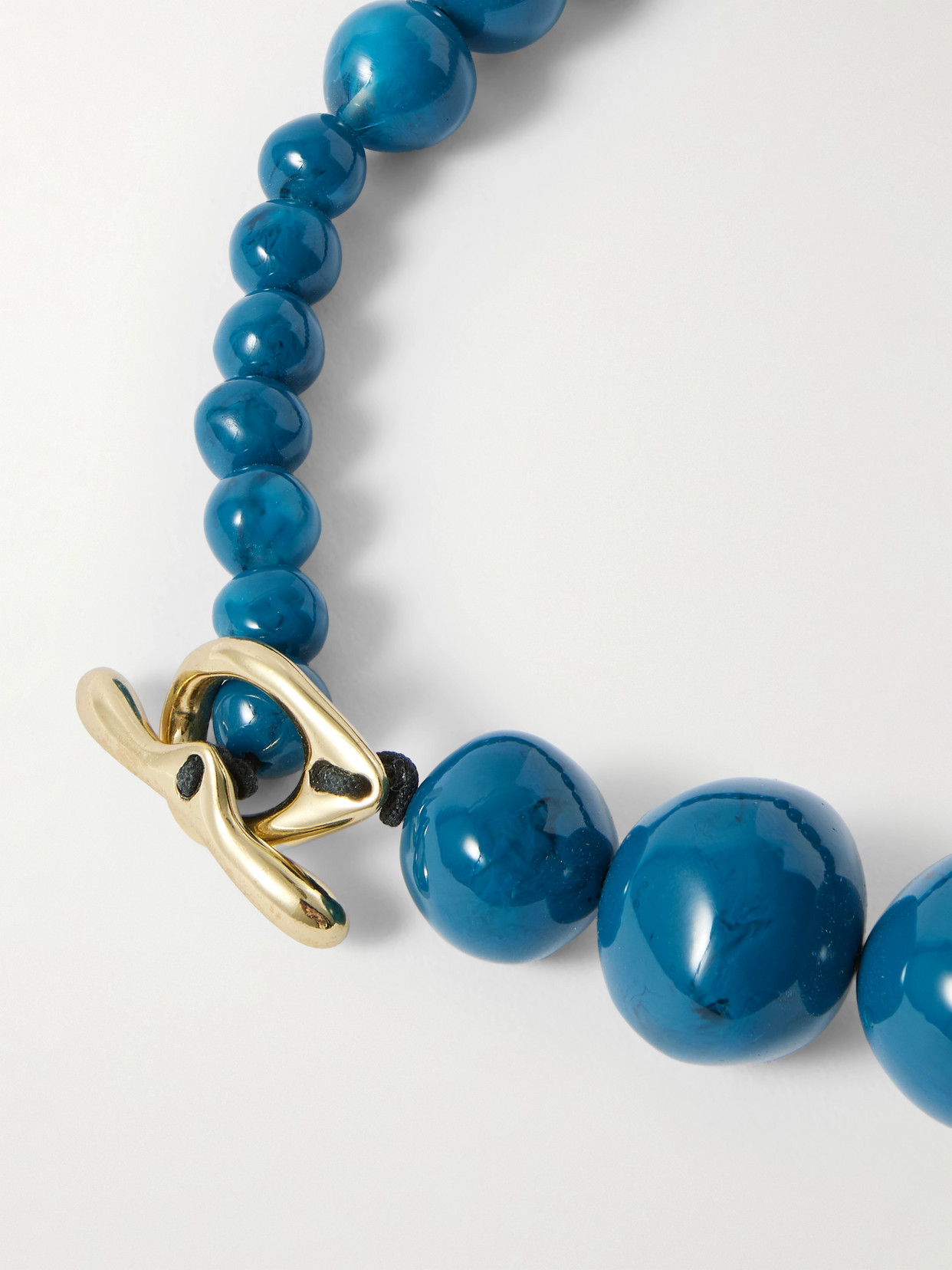 Dinosaur Designs Boulder Beads Resin Necklace In Blue