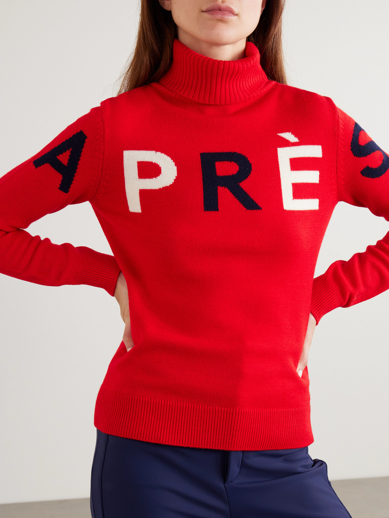 Perfect Moment Intarsia Merino Wool Turtleneck Sweater In Red