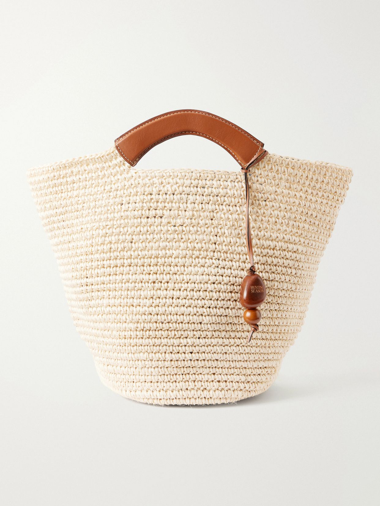 Leather-trimmed raffia tote