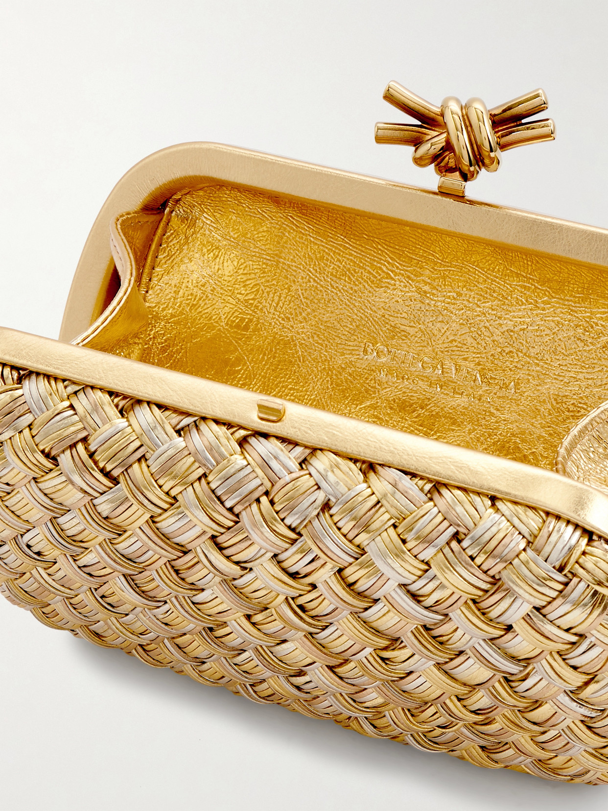 Bottega Veneta Knot Intrecciato Metallic Leather Clutch In Gold