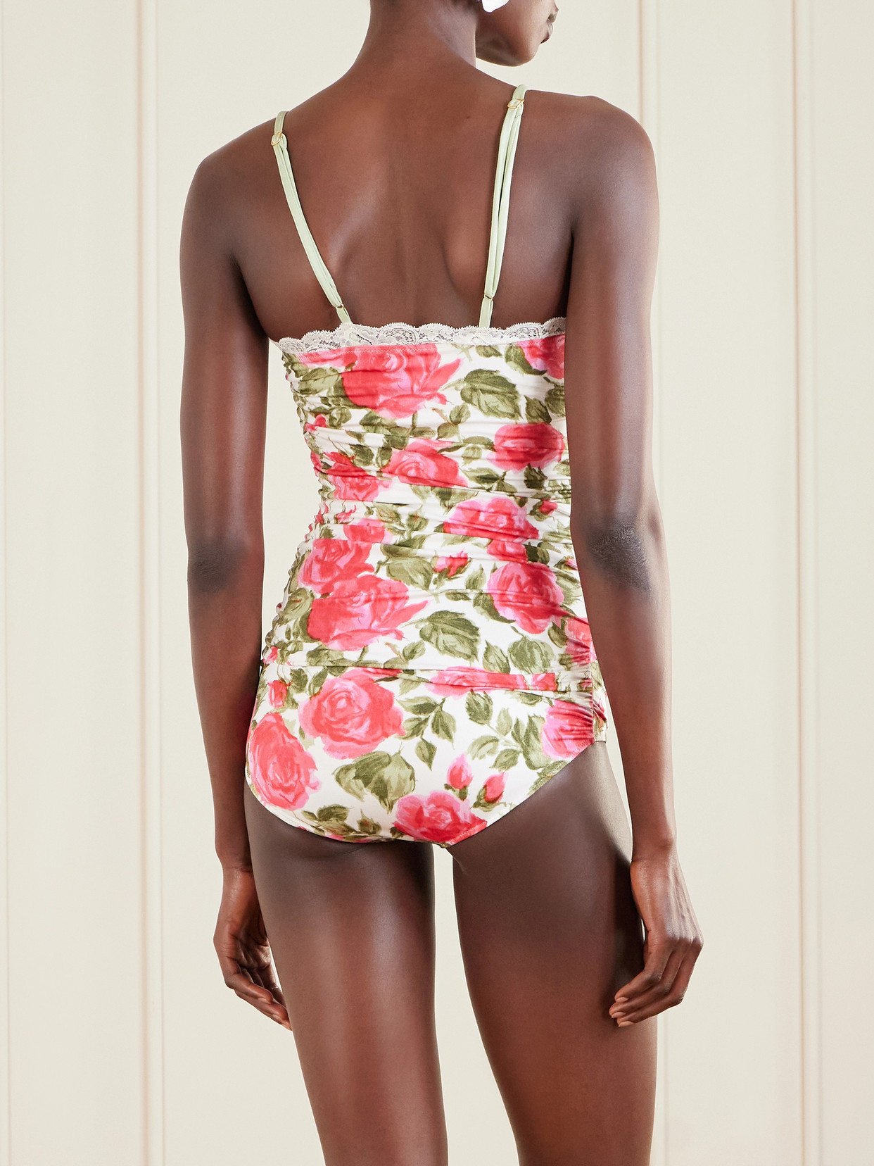 Chloé Bow-detailed Ruched Lace-trimmed Floral-print Swimsuit In Pink