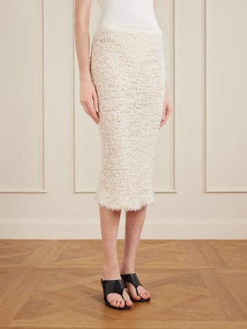 KHAITE Adela bouclé midi skirt