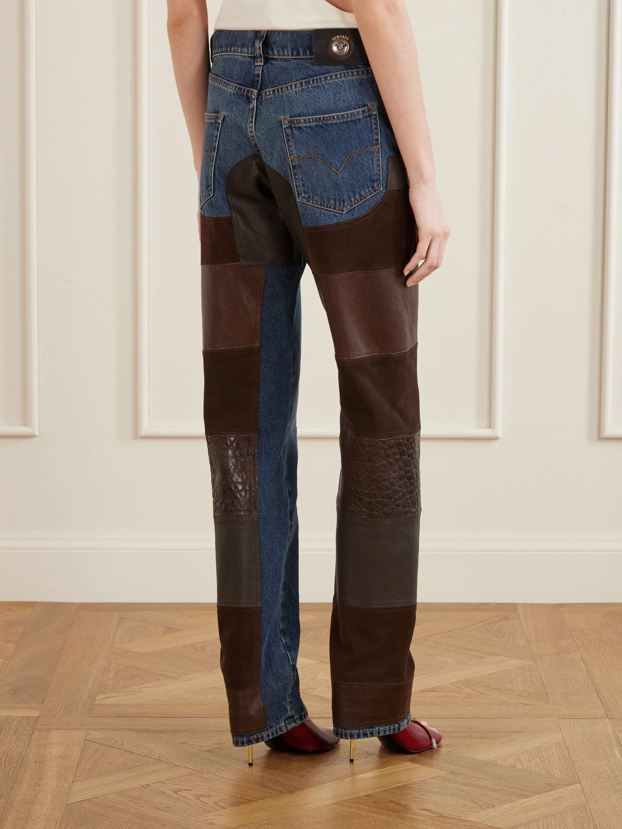 VERSACE Leather-trimmed mid-waist straight-leg jeans | NET-A-PORTER