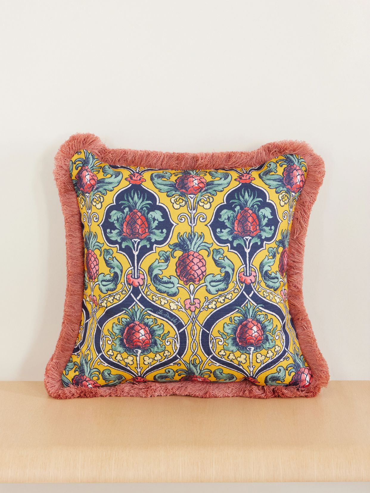 Floral-printed fringed-trimmed cushion