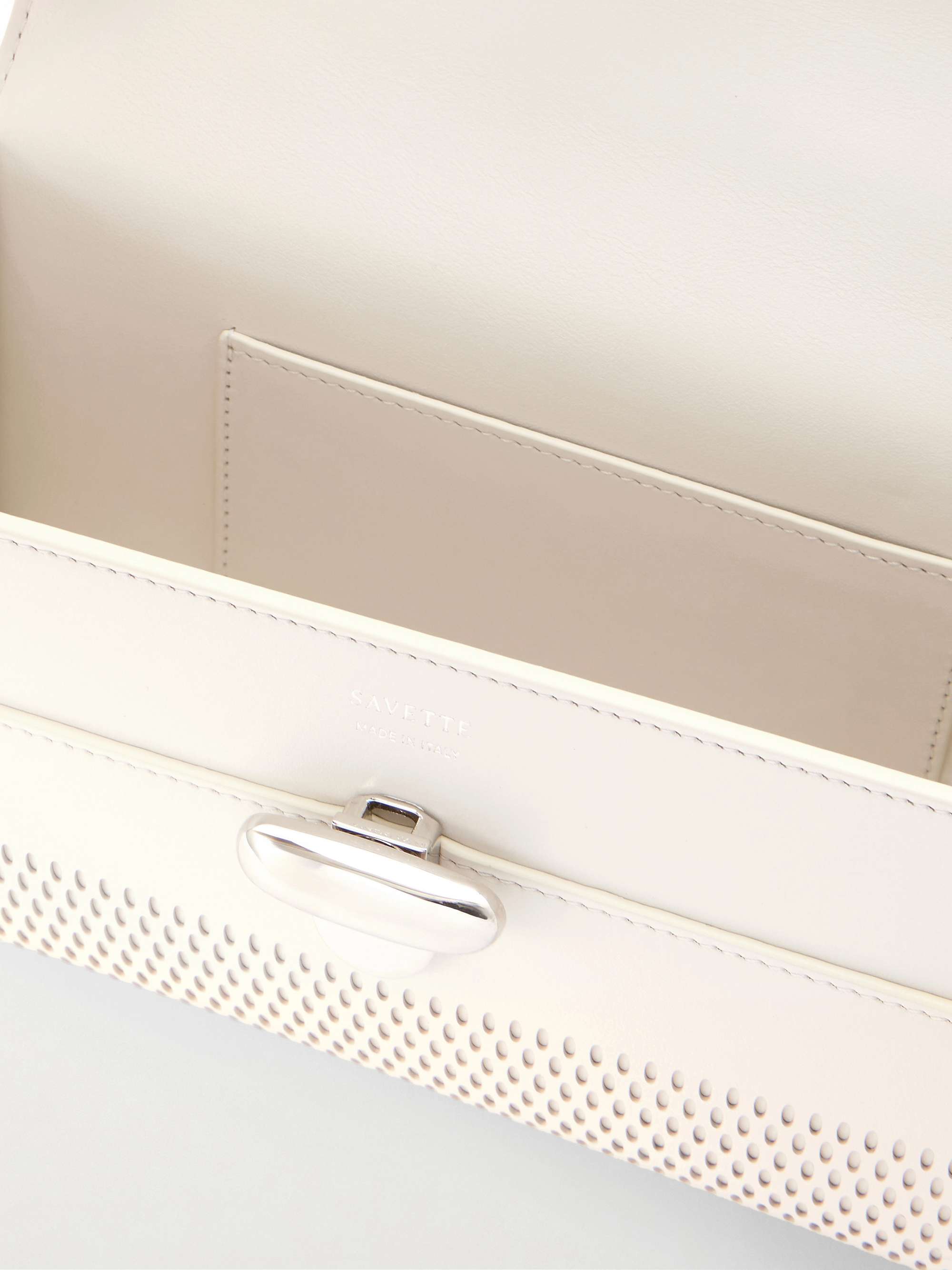 SAVETTE Symmetry laser-cut leather clutch | NET-A-PORTER