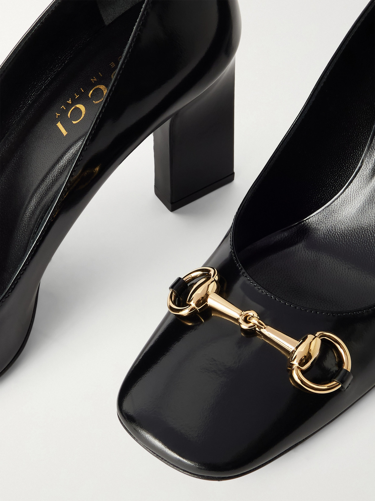 Signora Horsebit-Embellished Glossed Pumps