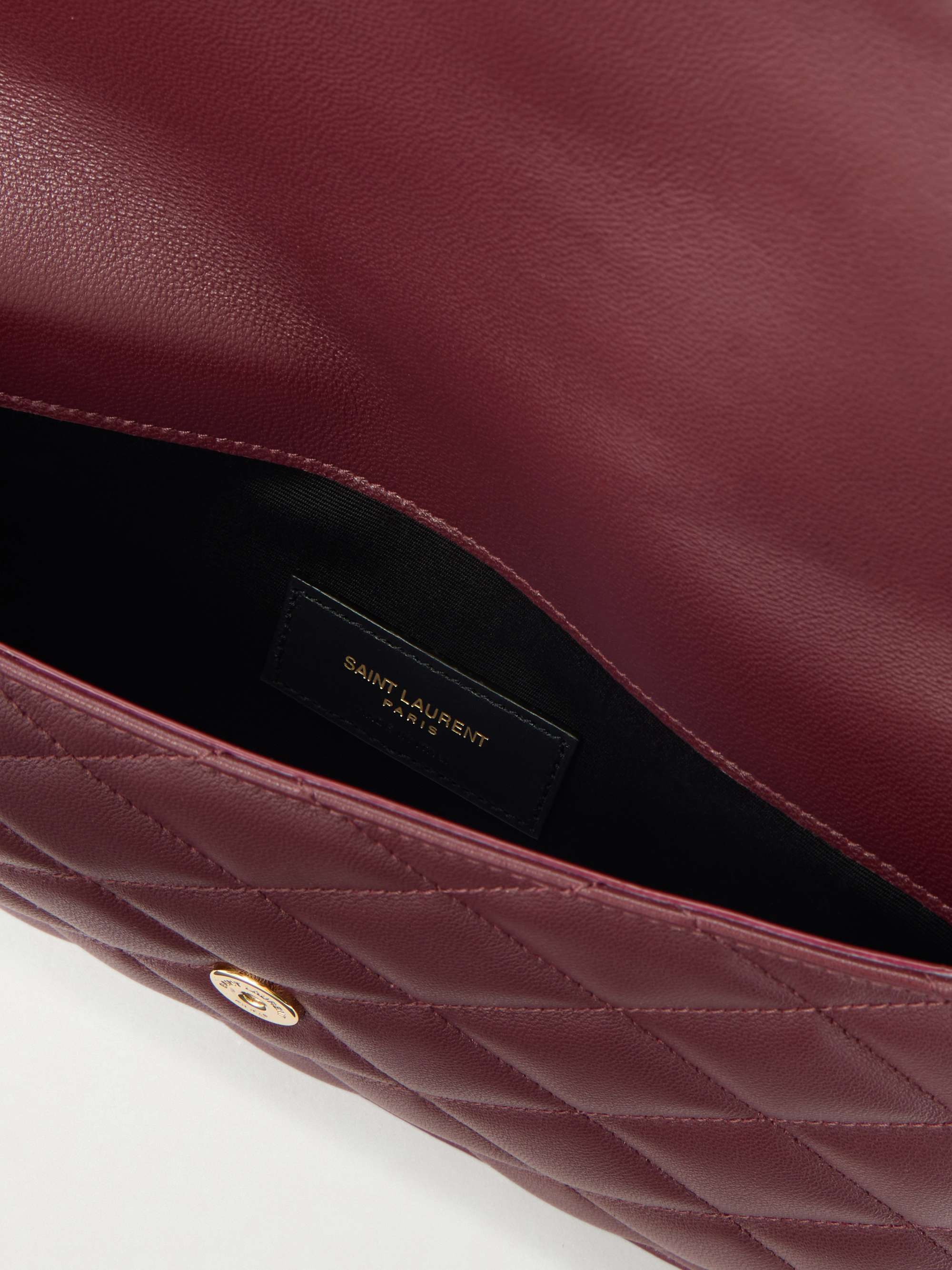 SAINT LAURENT Paris matelassé leather pouch | NET-A-PORTER