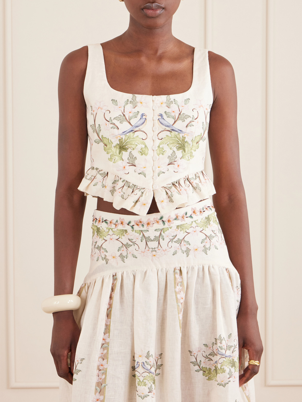 Eslabon Anhelo Floral-Print Button-Embellished Linen Cropped Top