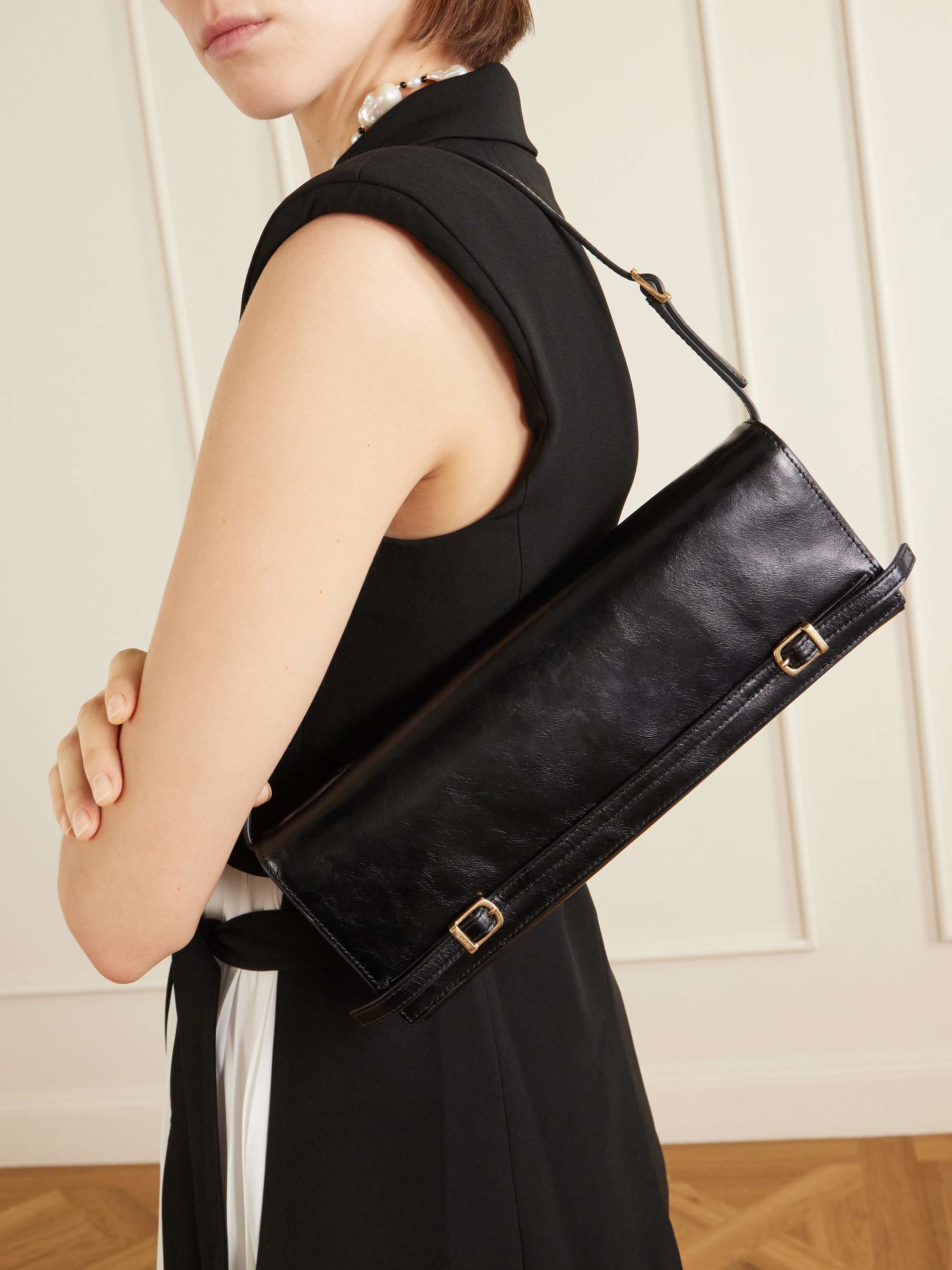 SIMKHAI River East-West Moto leather clutch bag | NET-A-PORTER