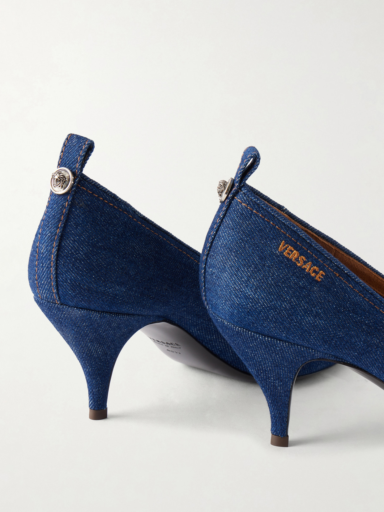 Tina 65 Medusa-Embellished Denim Pumps