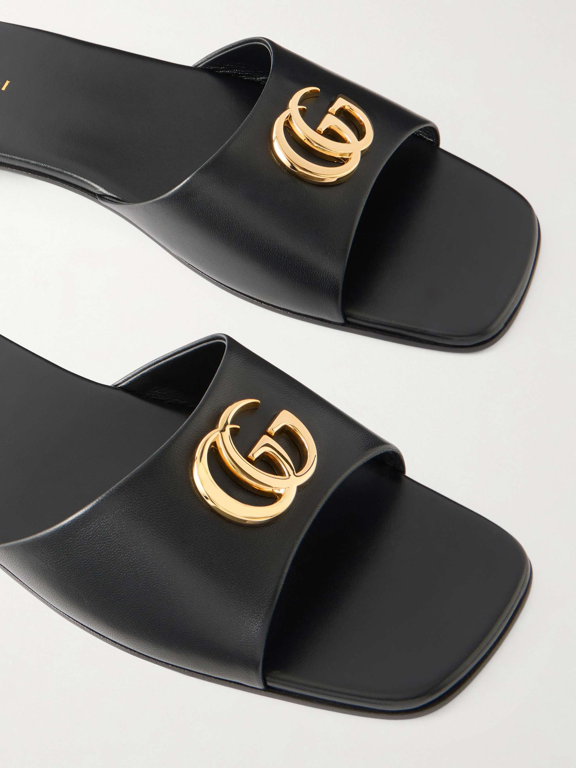 GUCCI Logo-embellished leather slides | NET-A-PORTER