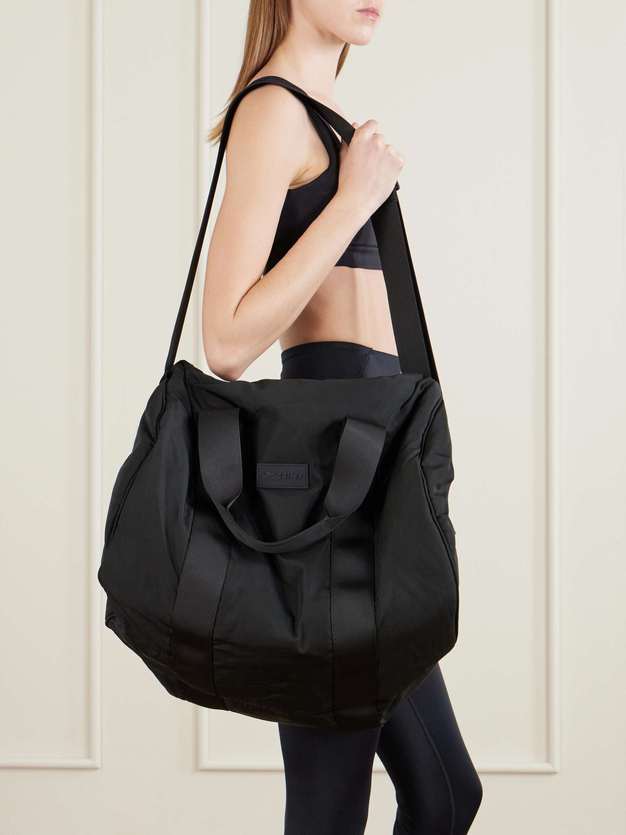 SKIMS + Nike Puffer Gym Bag - Obsidian | NET-A-PORTER