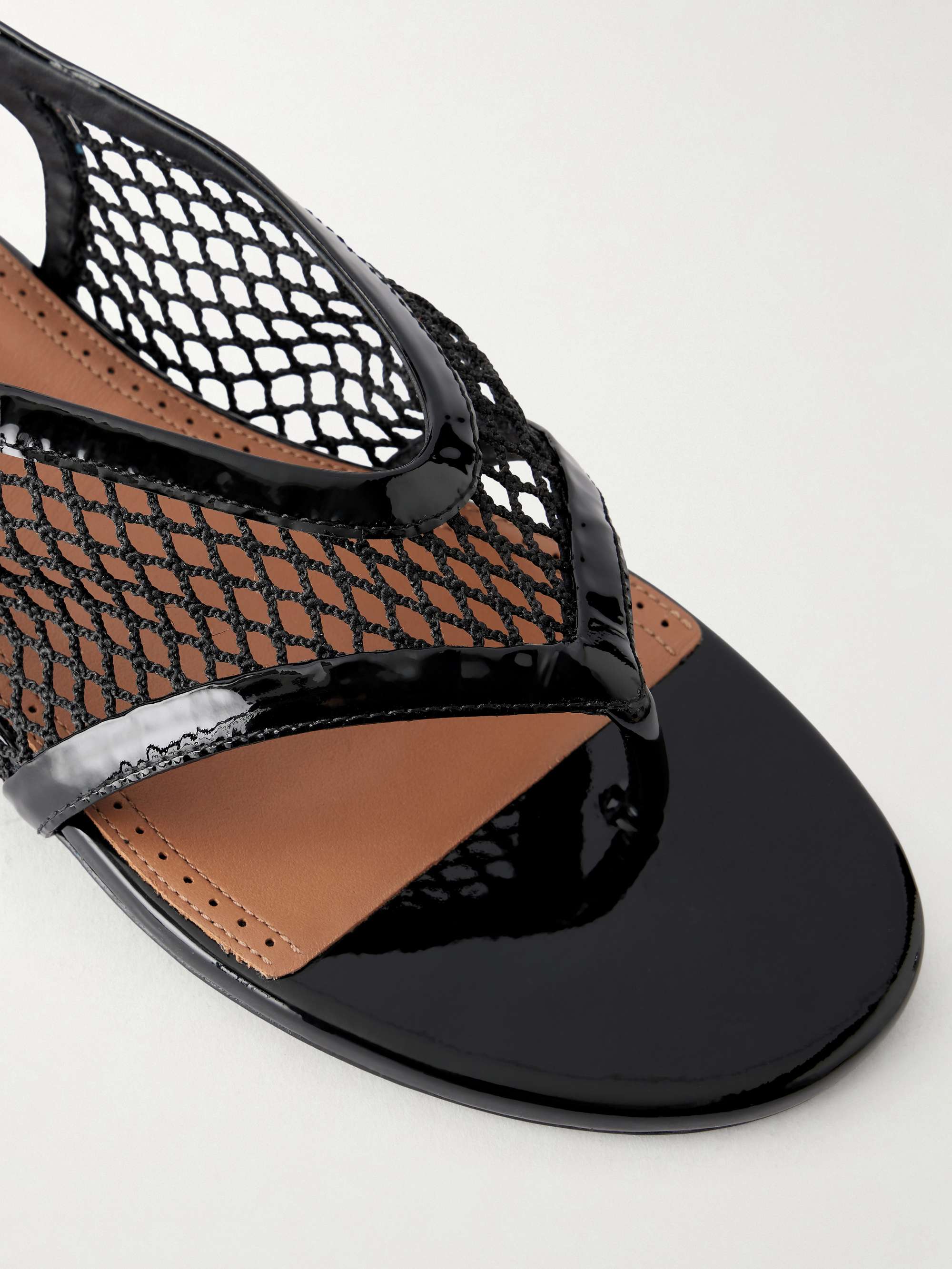 ALAÏA Fishnet flat sandals | NET-A-PORTER