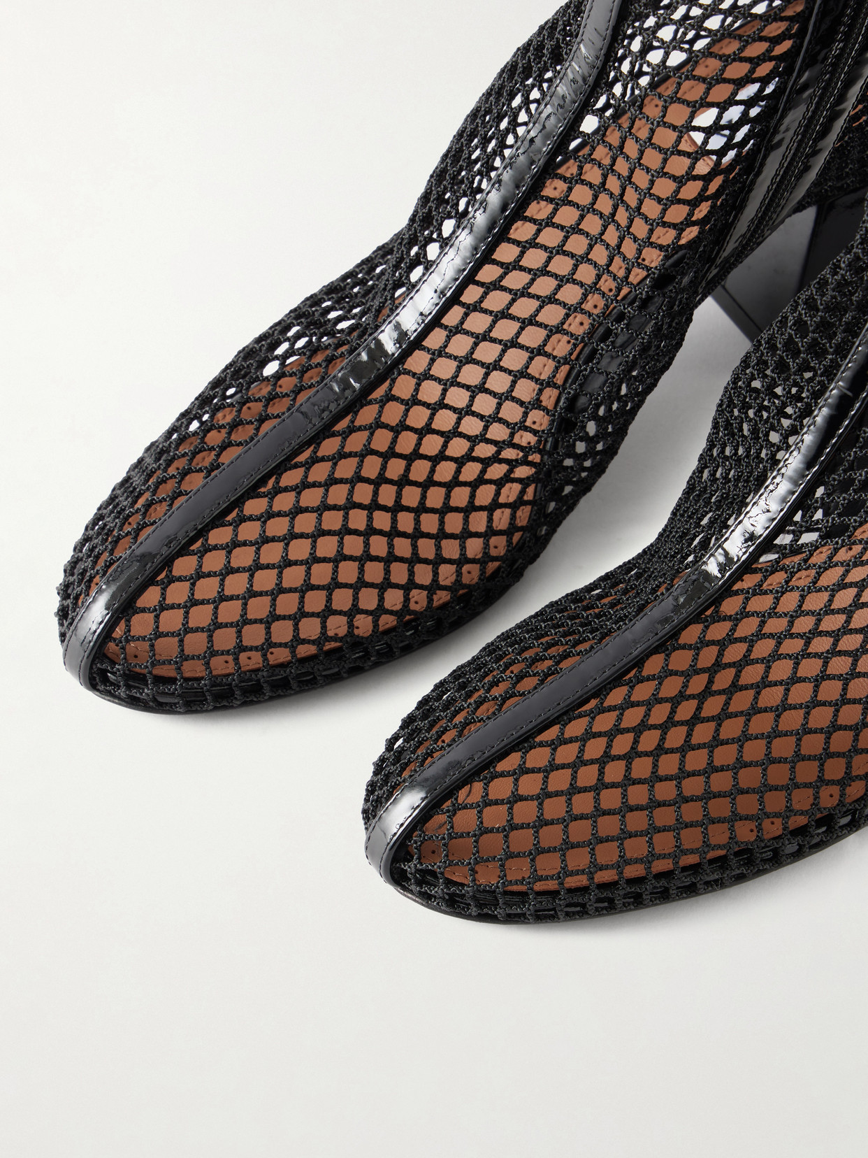 Alaïa Fishnet Patent Leather-trimmed Ankle Boots In Black