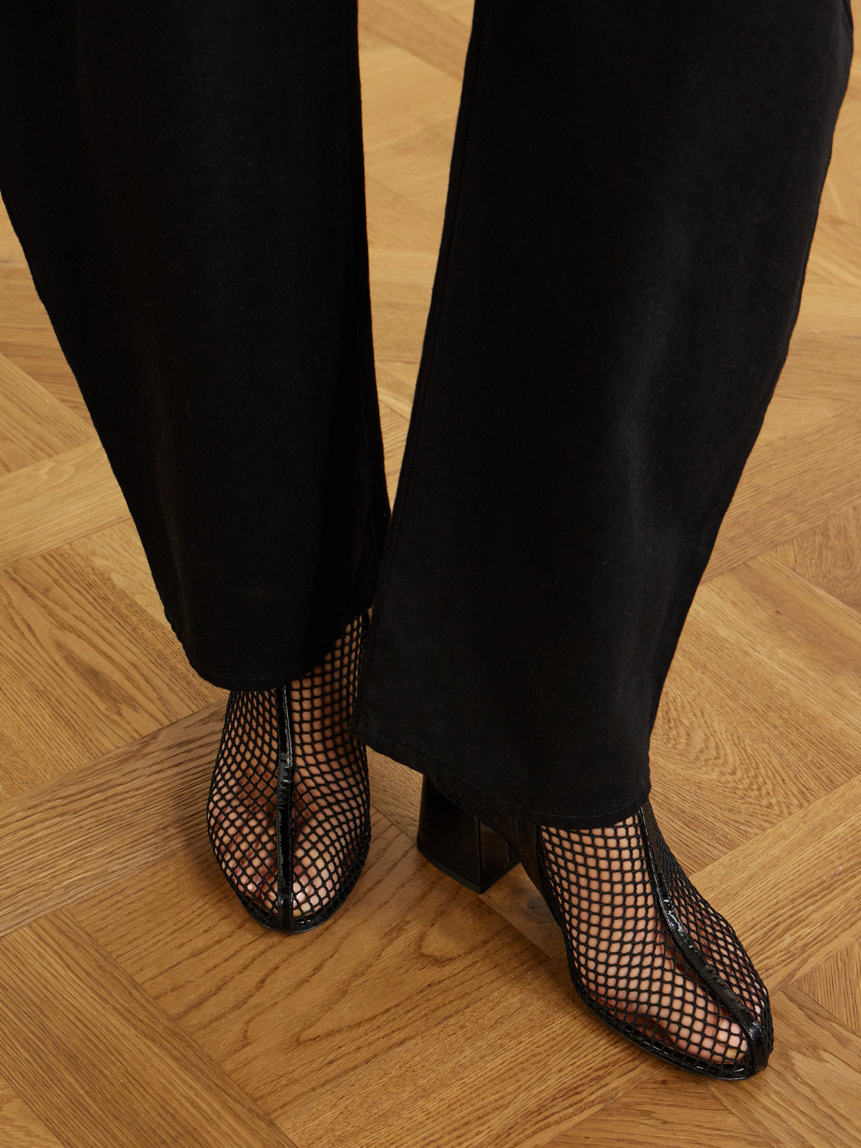 Alaïa Fishnet Patent Leather-trimmed Ankle Boots In Black