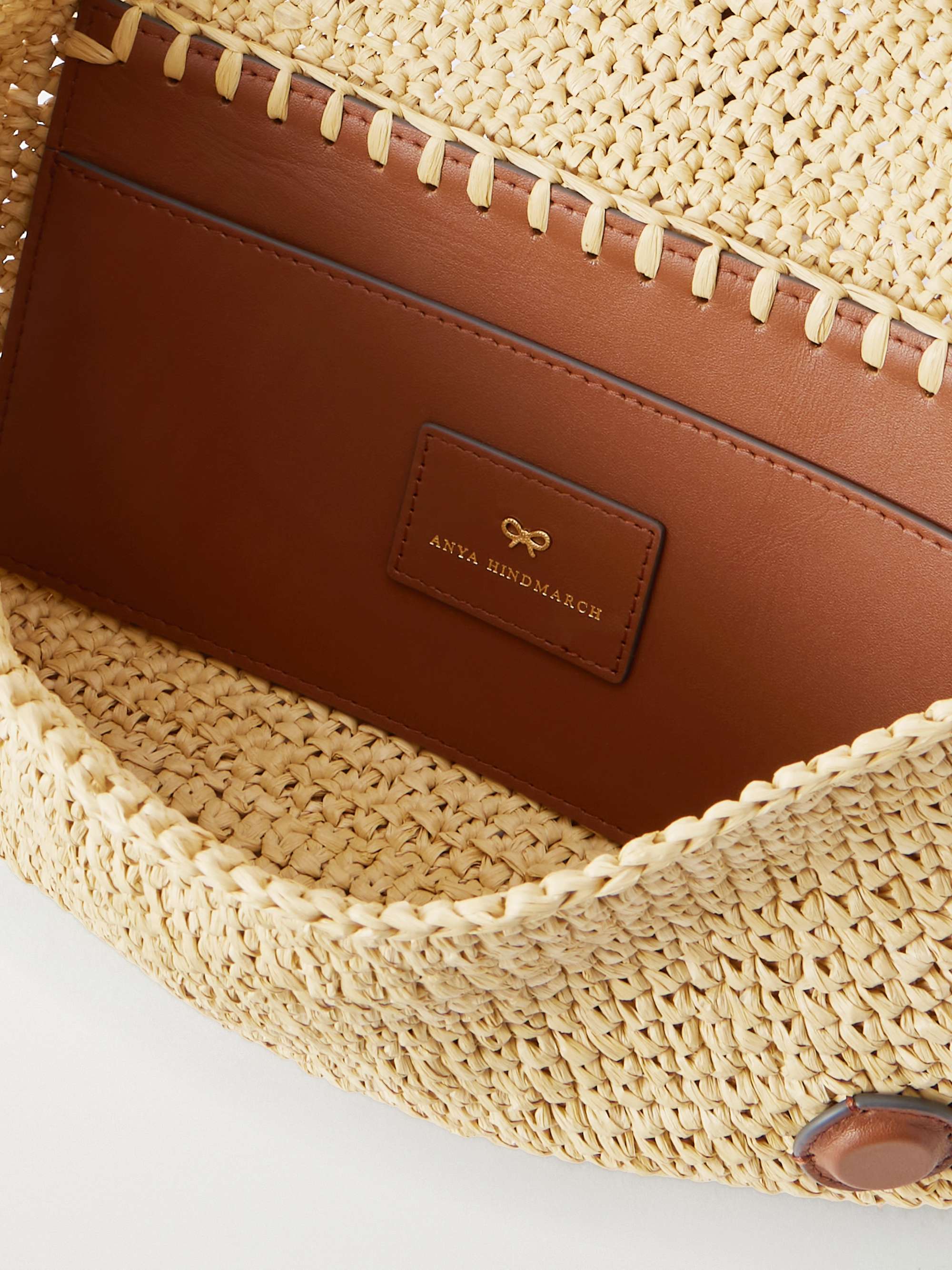 ANYA HINDMARCH Bow leather-trimmed raffia clutch | NET-A-PORTER