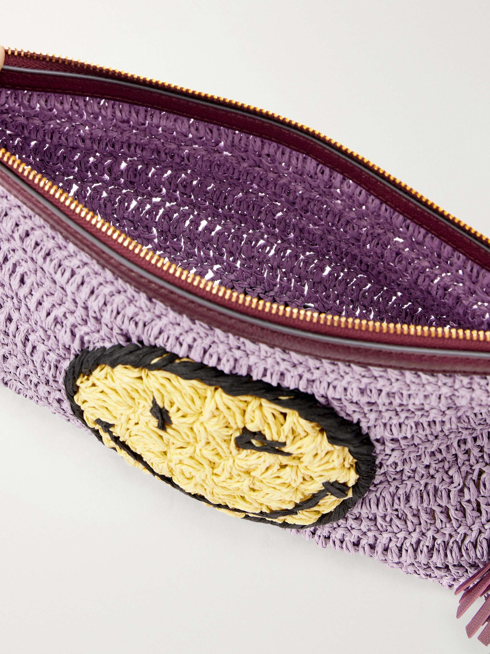 ANYA HINDMARCH Wink tasseled leather-trimmed raffia clutch bag