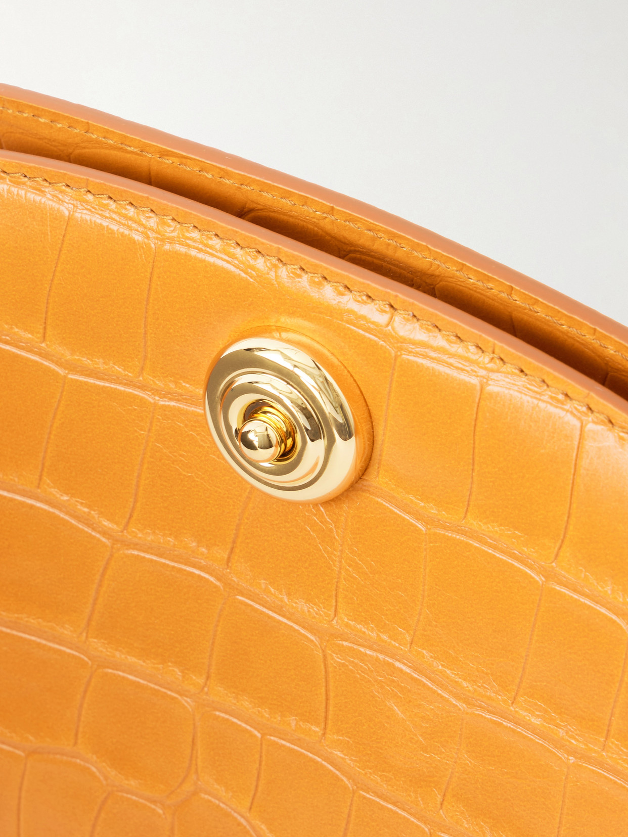 Liffner Pushlock Croc-effect Leather Clutch In Gold