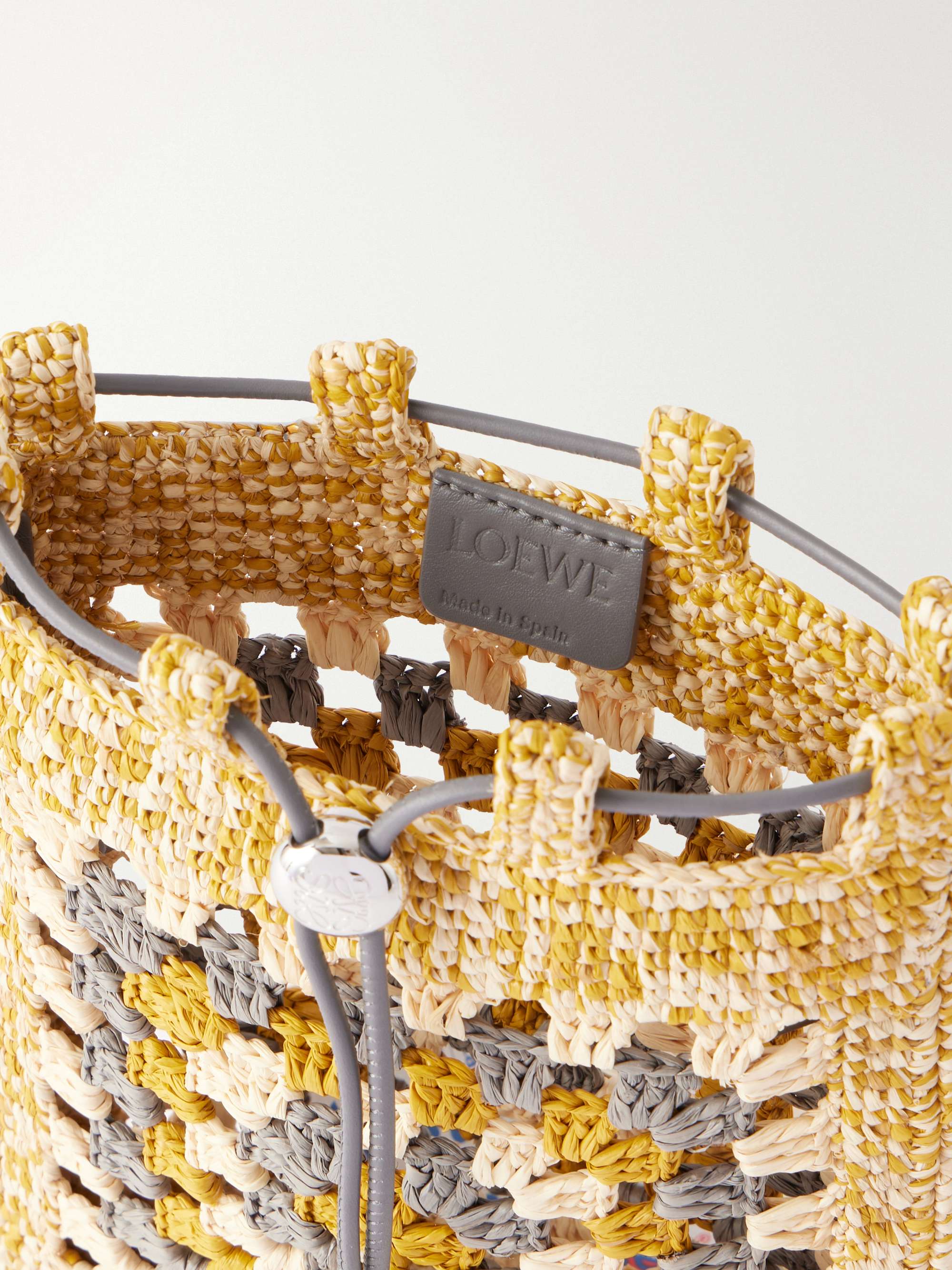 LOEWE + Paula's Ibiza leather-trimmed crocheted raffia bucket bag