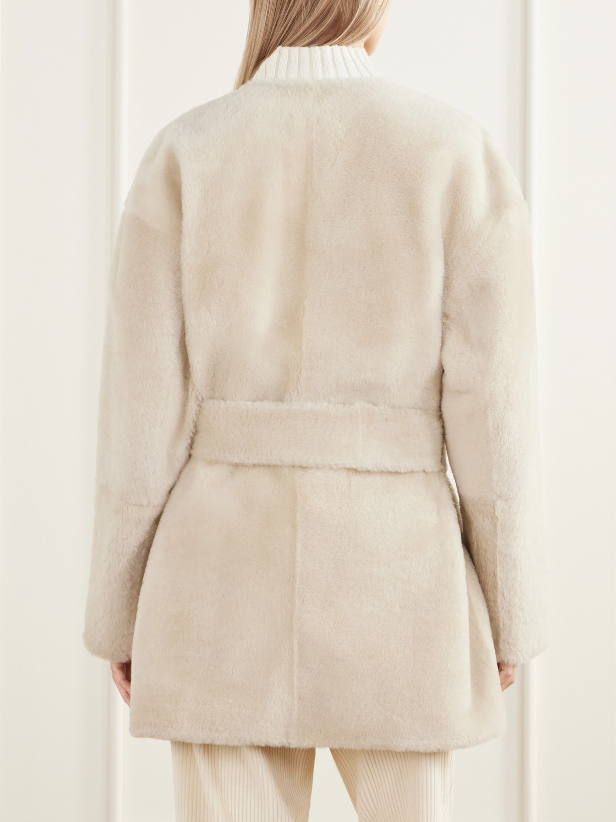 Sasha Collarless Belted Shearling Coat