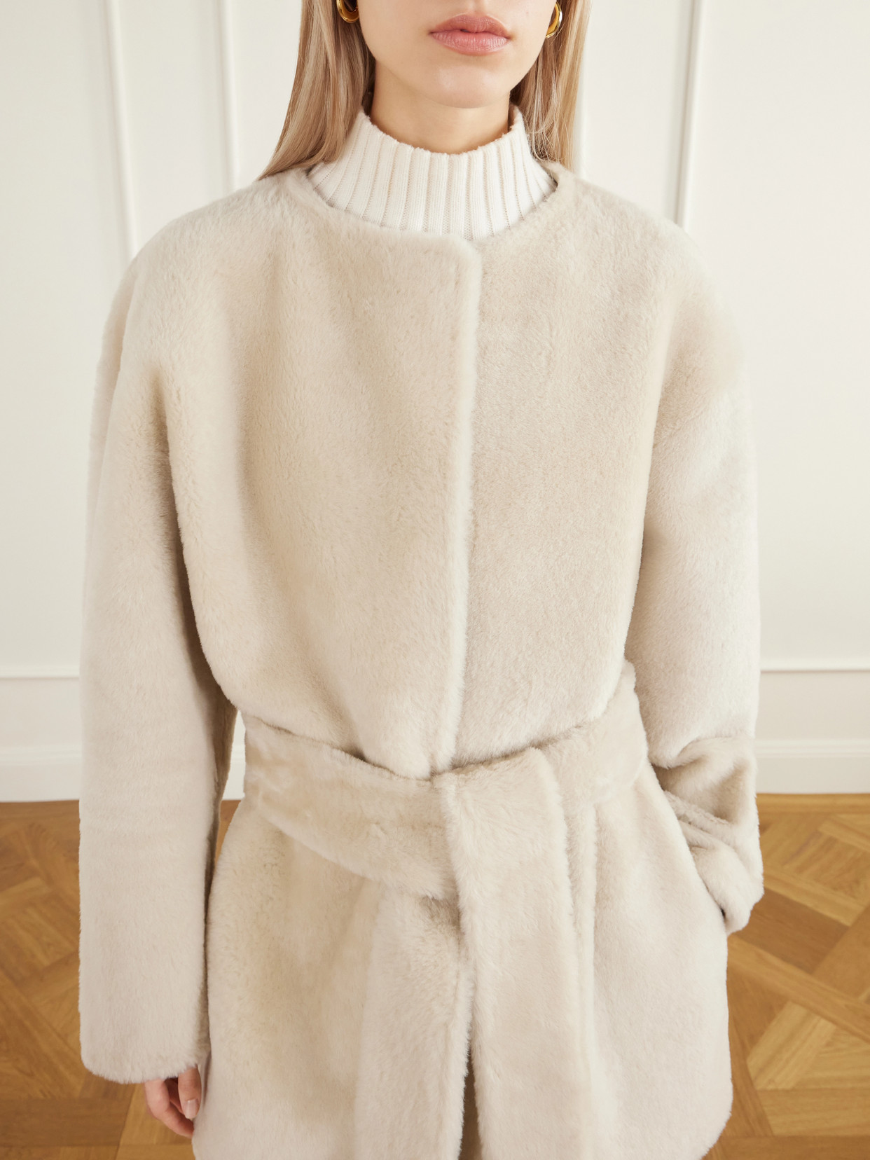 Sasha Collarless Belted Shearling Coat