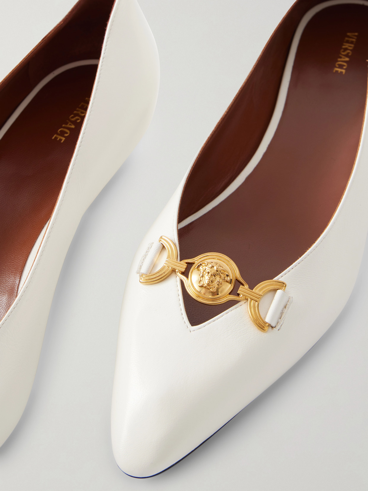 Medusa-Embellished Ballet Flats
