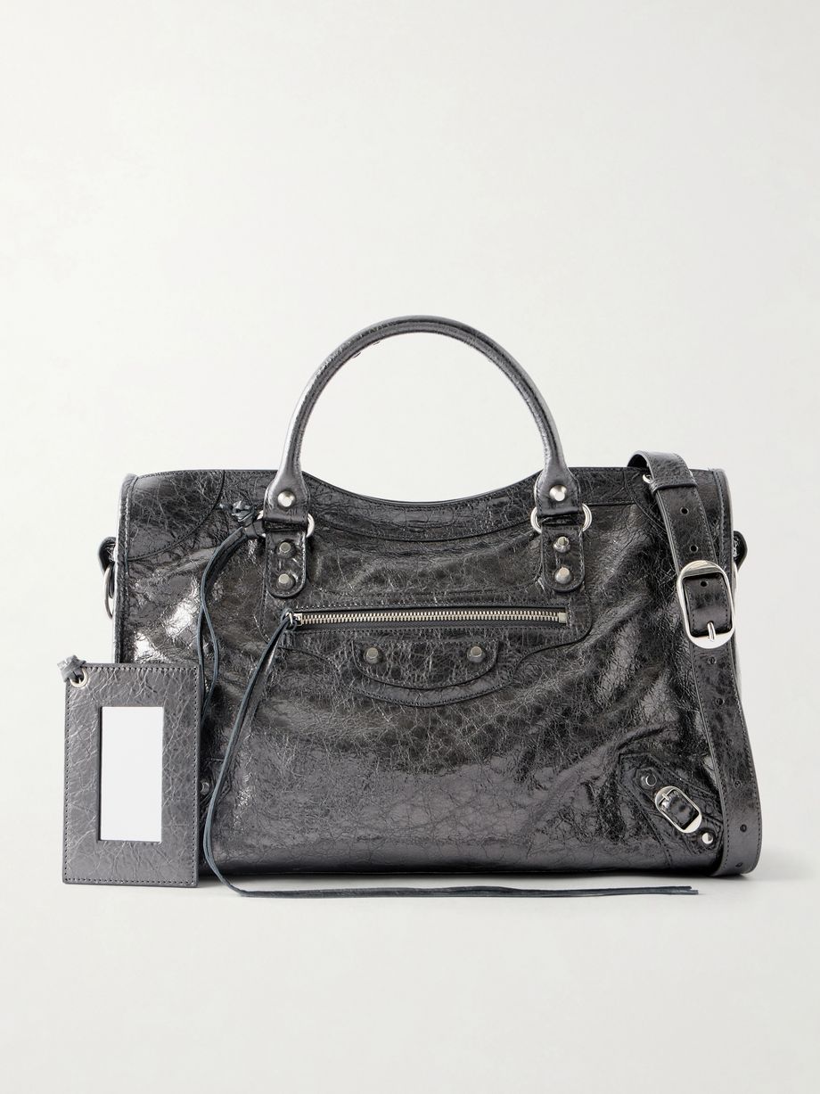Le City studded leather-trimmed suede shoulder bag