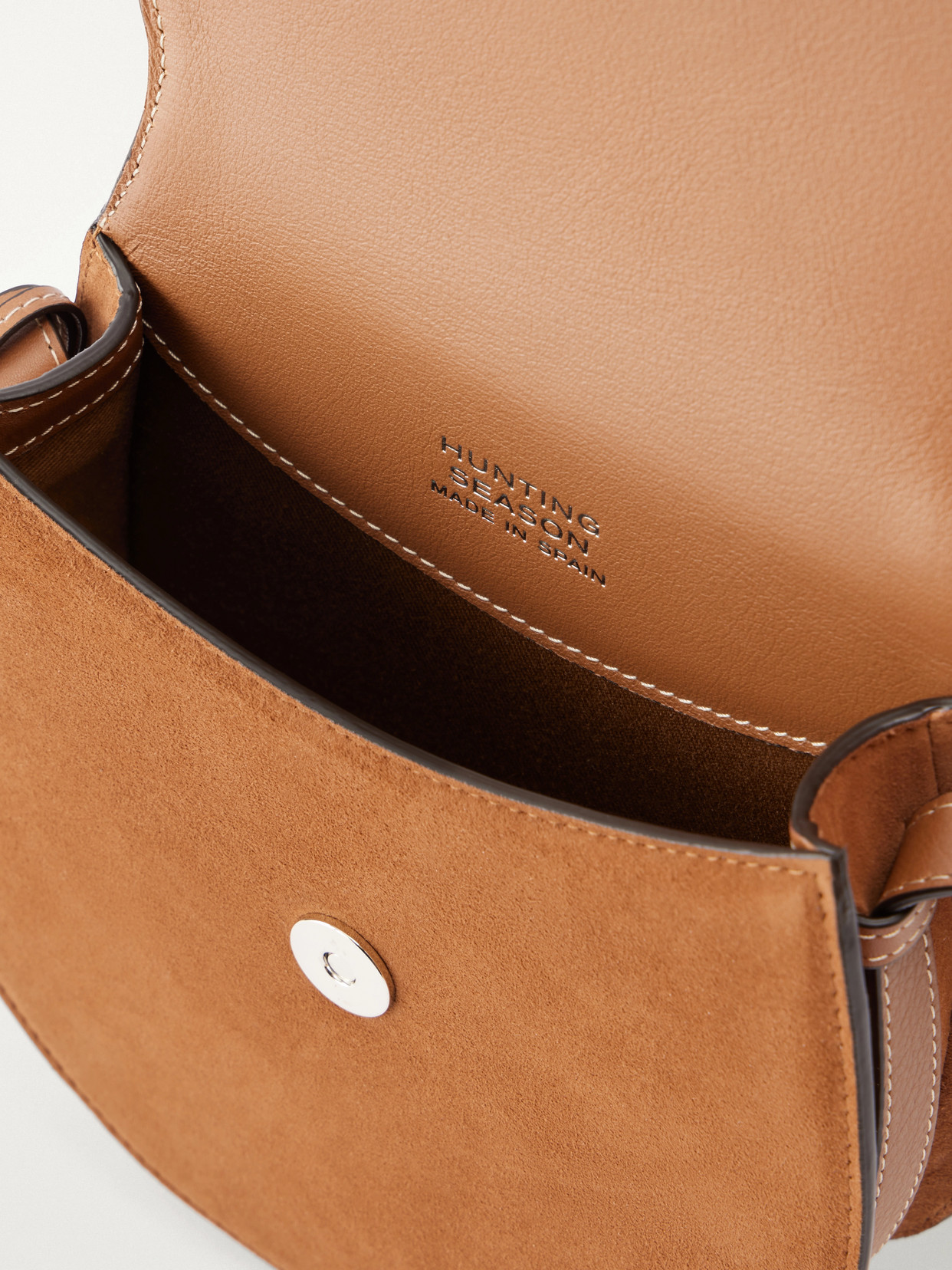The Small Saddle Tasseled Shoulder Bag