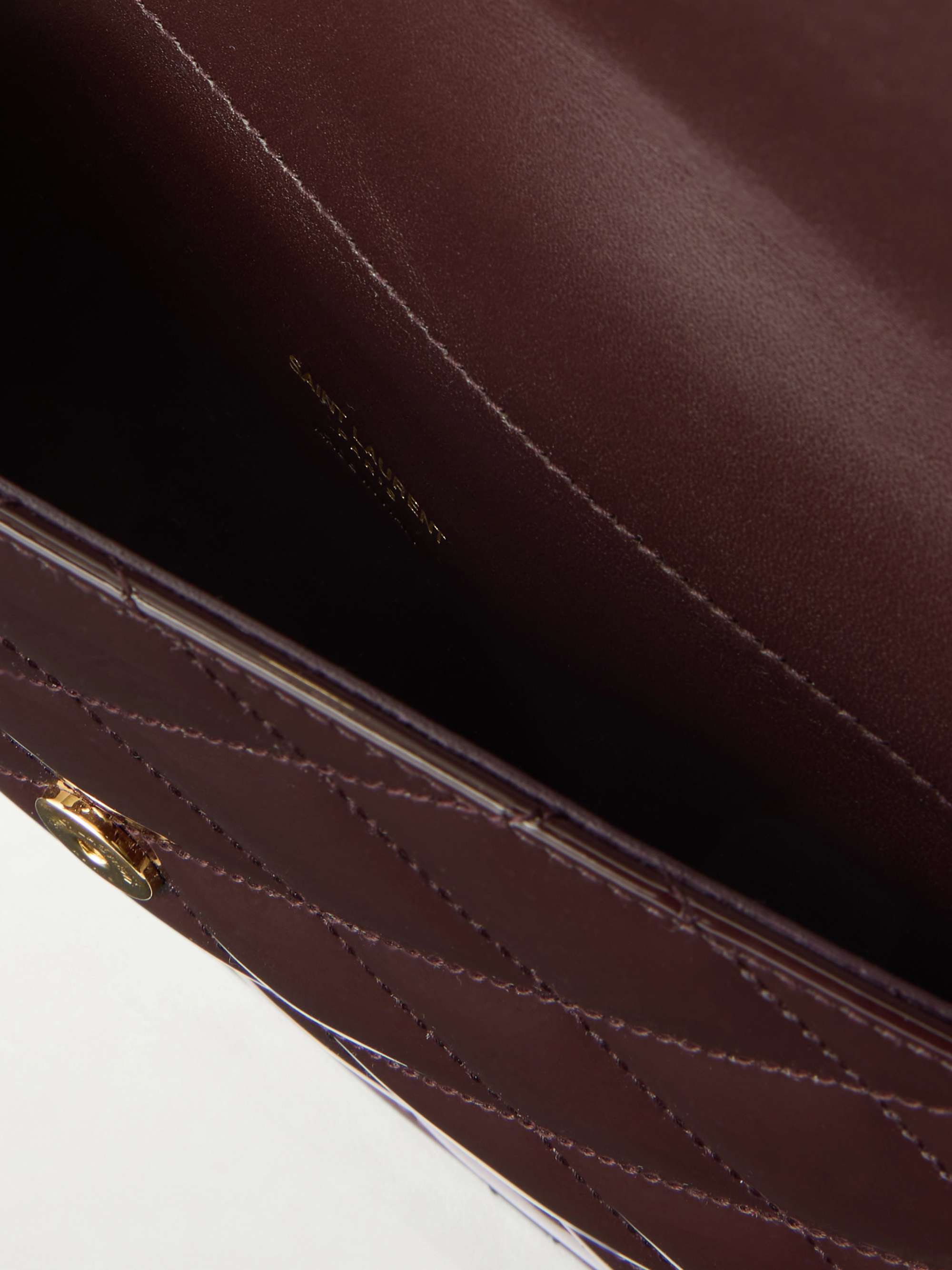 SAINT LAURENT Paris Matelassé patent-leather clutch | NET-A-PORTER