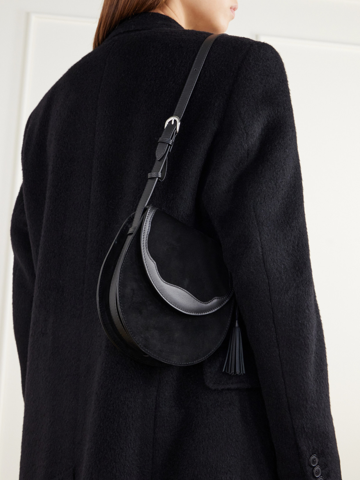 The Small Saddle Tasseled Shoulder Bag