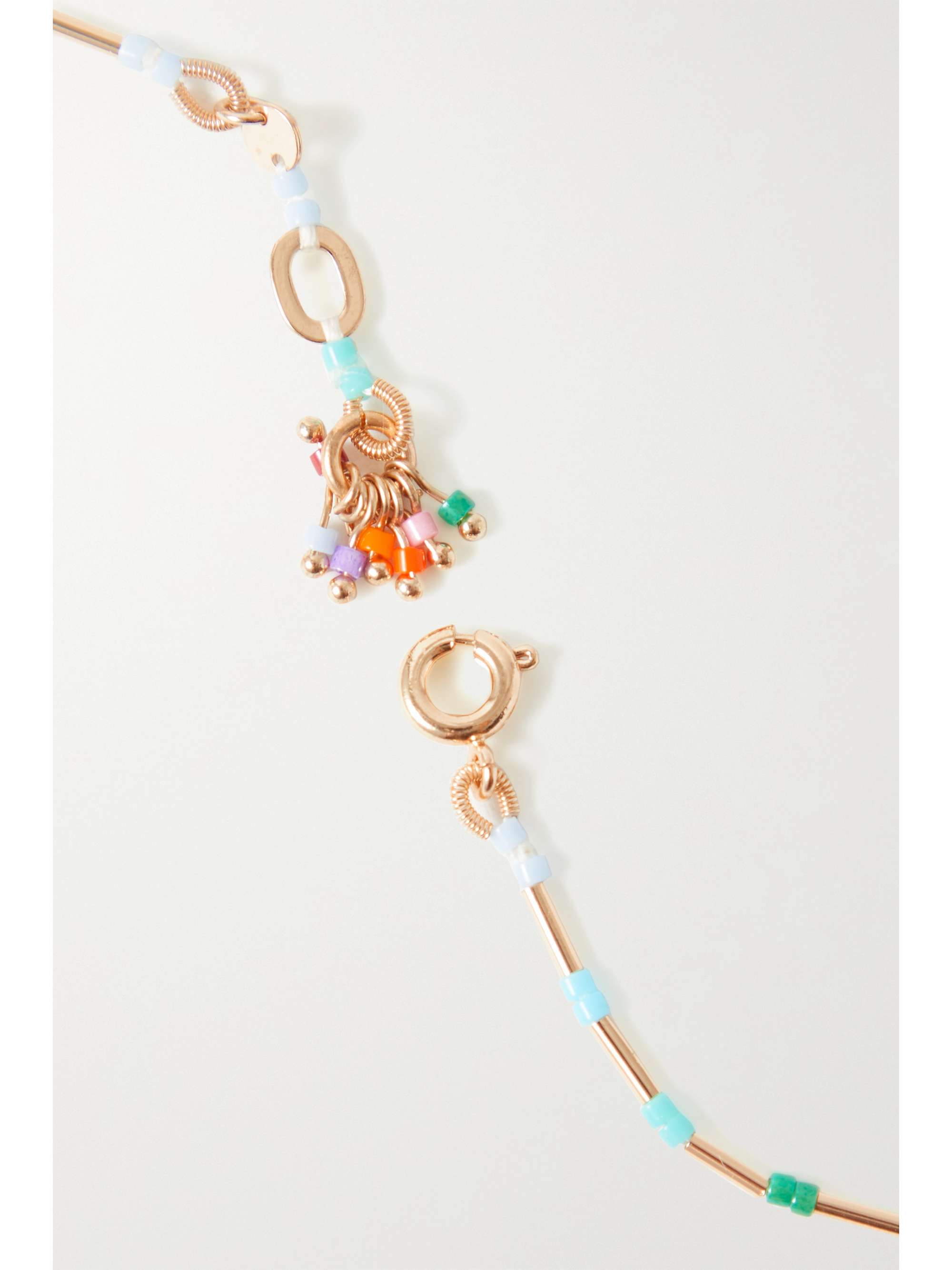 ROXANNE ASSOULIN Set de trois bijoux de cheville en perles et métal doré