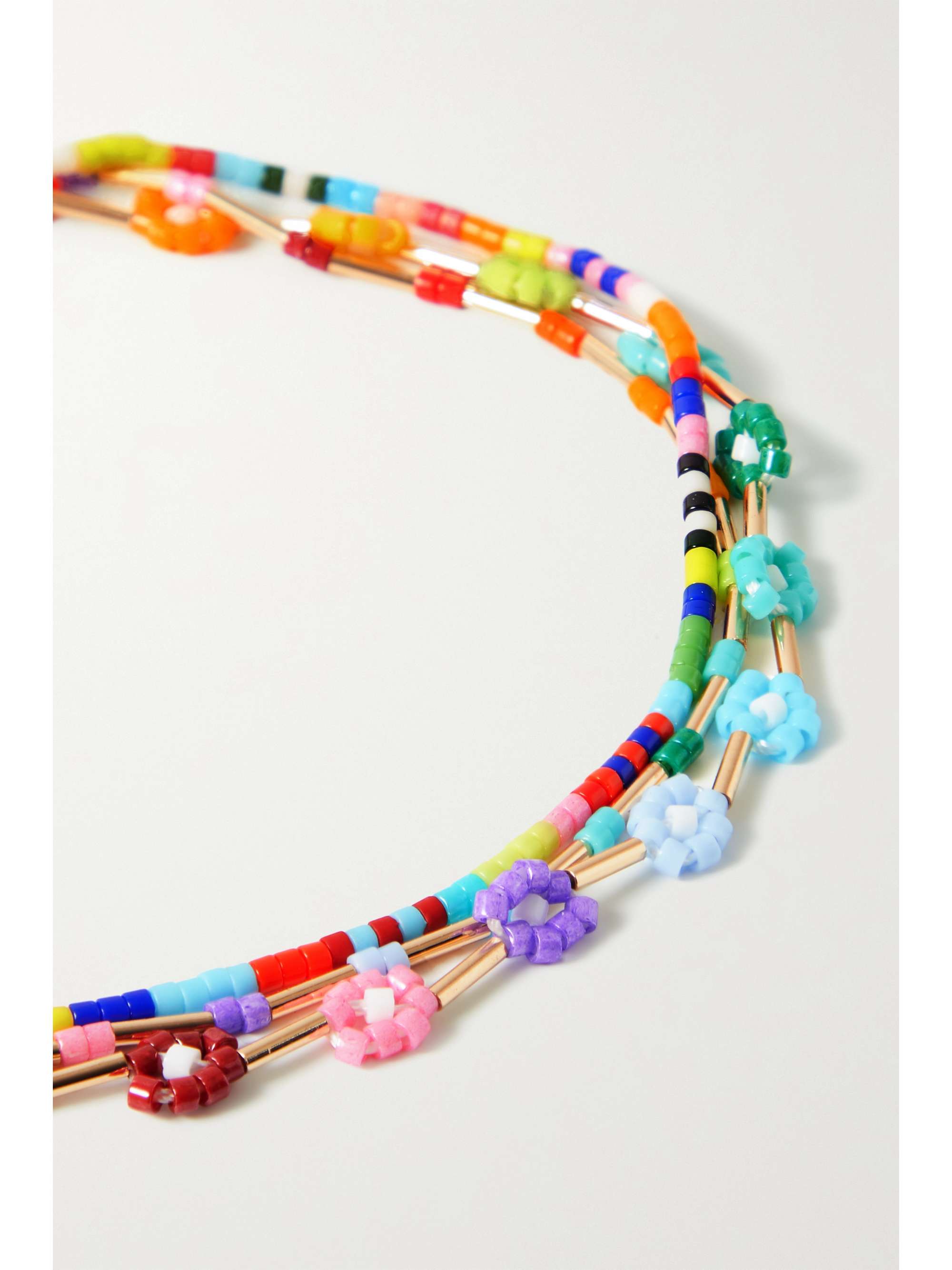 ROXANNE ASSOULIN Set de trois bijoux de cheville en perles et métal doré