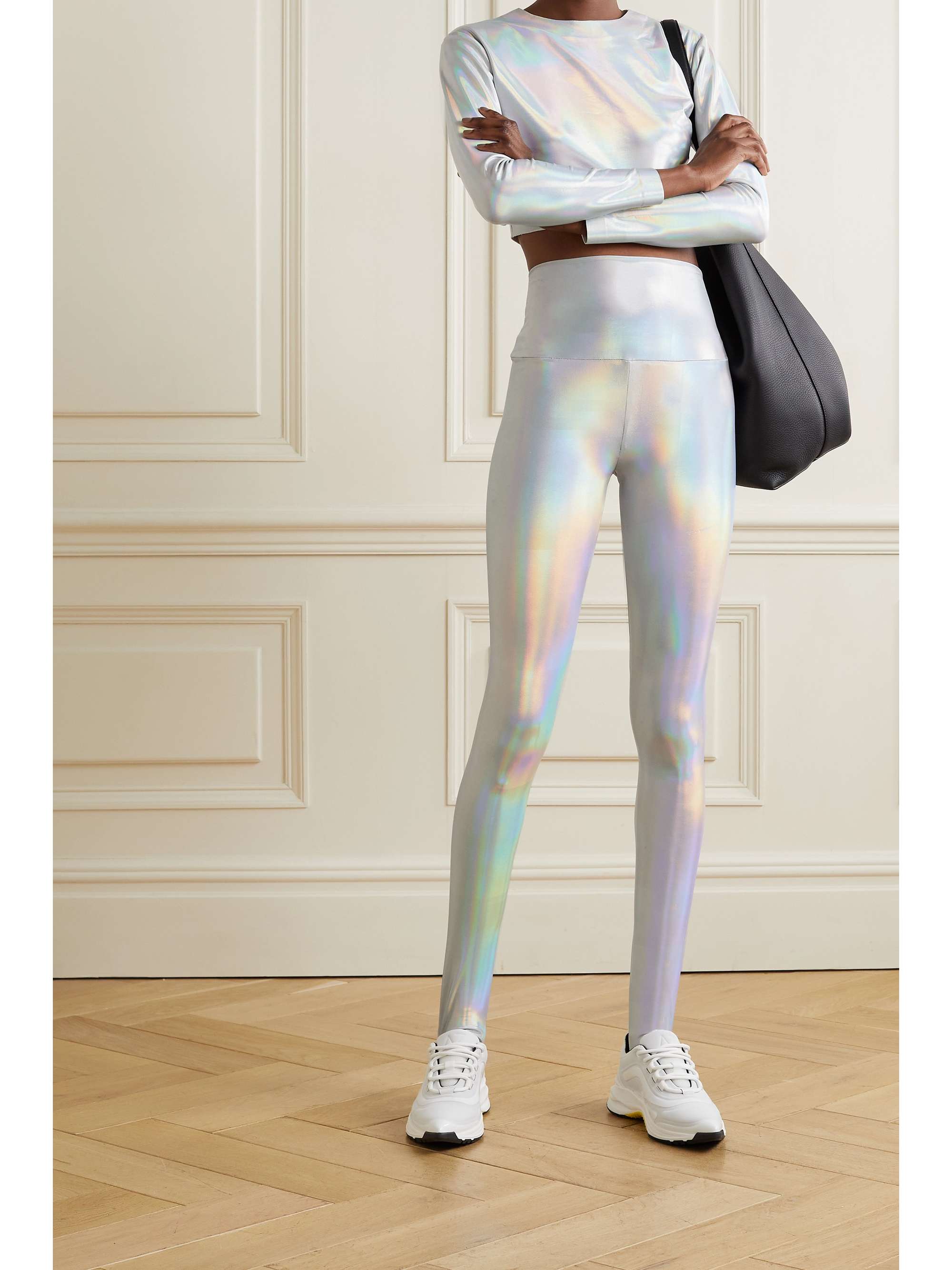 NORMA KAMALI ليغينغز من الجيرسي المطاط بلمعة متقزّحة مع فتحة عند الكعب