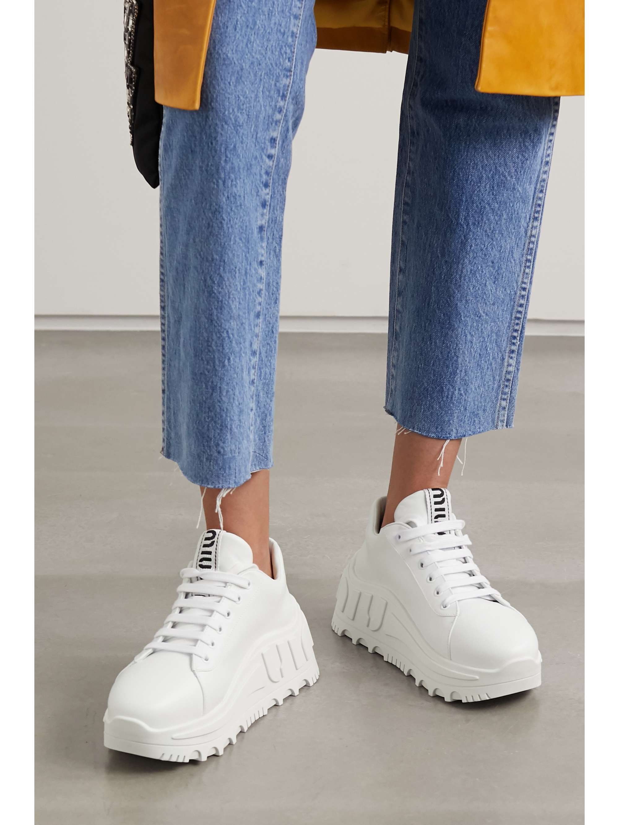 white leather slim converse