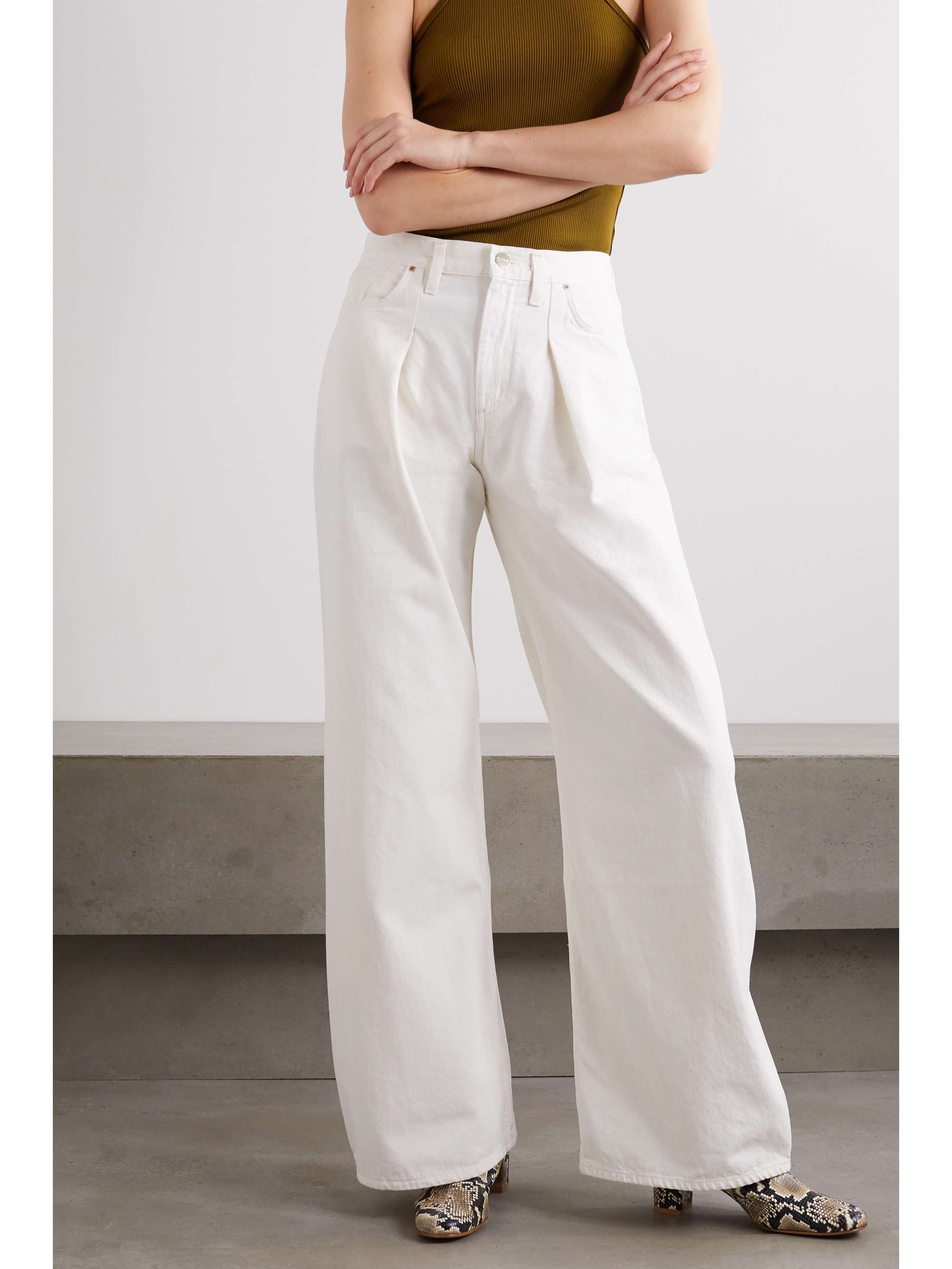 GOLDSIGN + NET SUSTAIN pleated high-rise wide-leg jeans