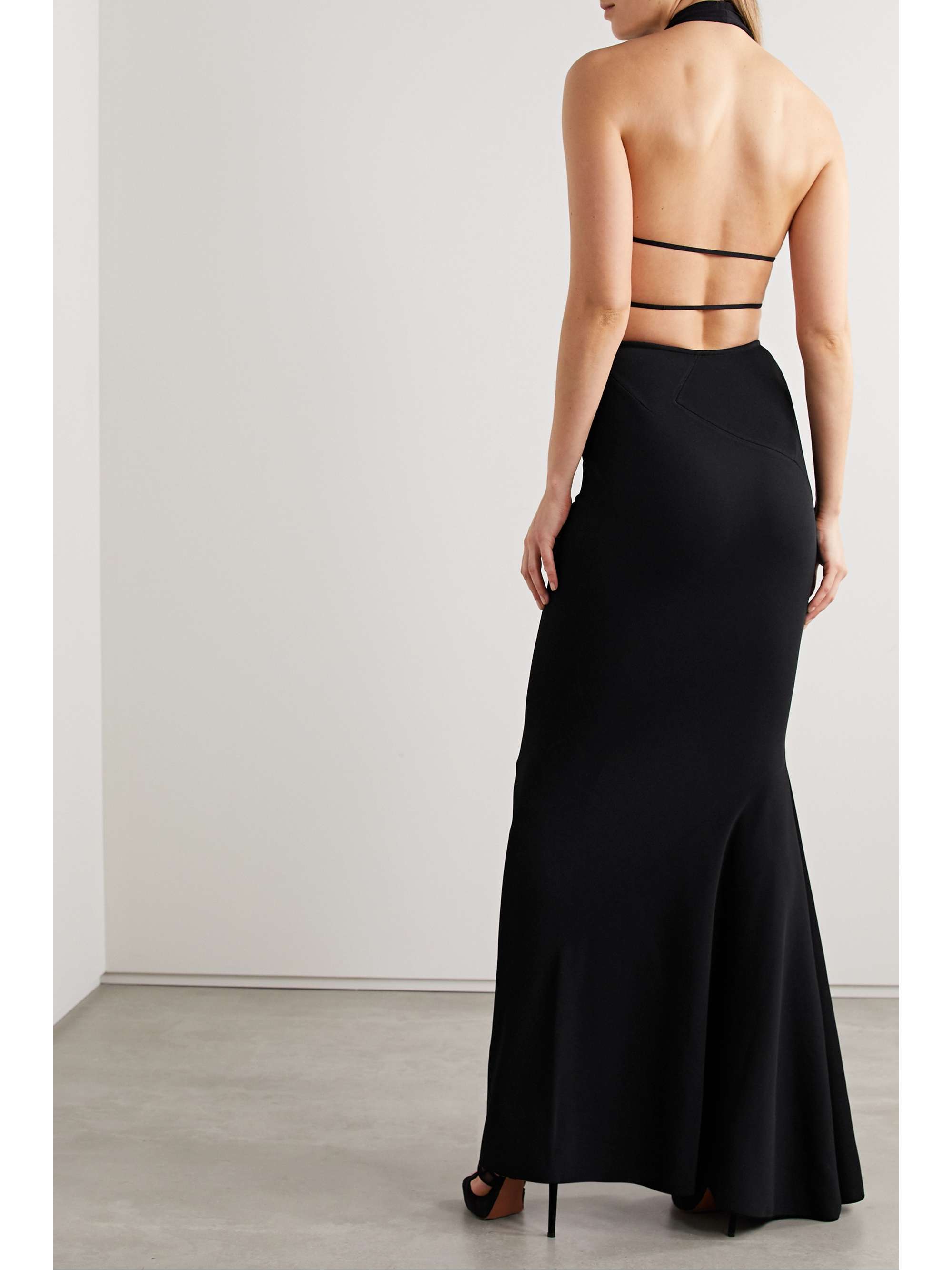 ALAÏA Open-back wrap-effect stretch-knit halterneck gown