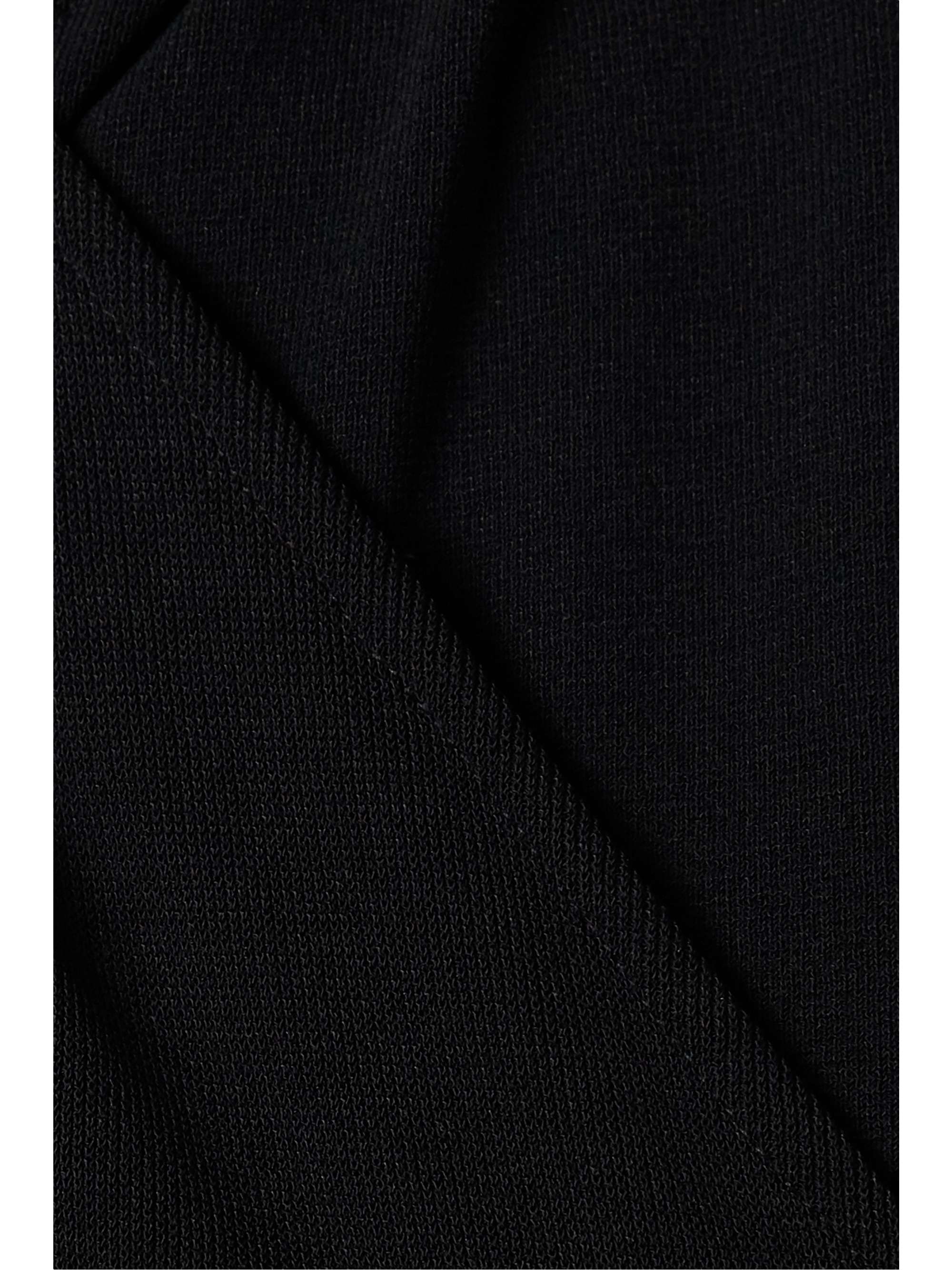 ALAÏA Open-back wrap-effect stretch-knit halterneck gown