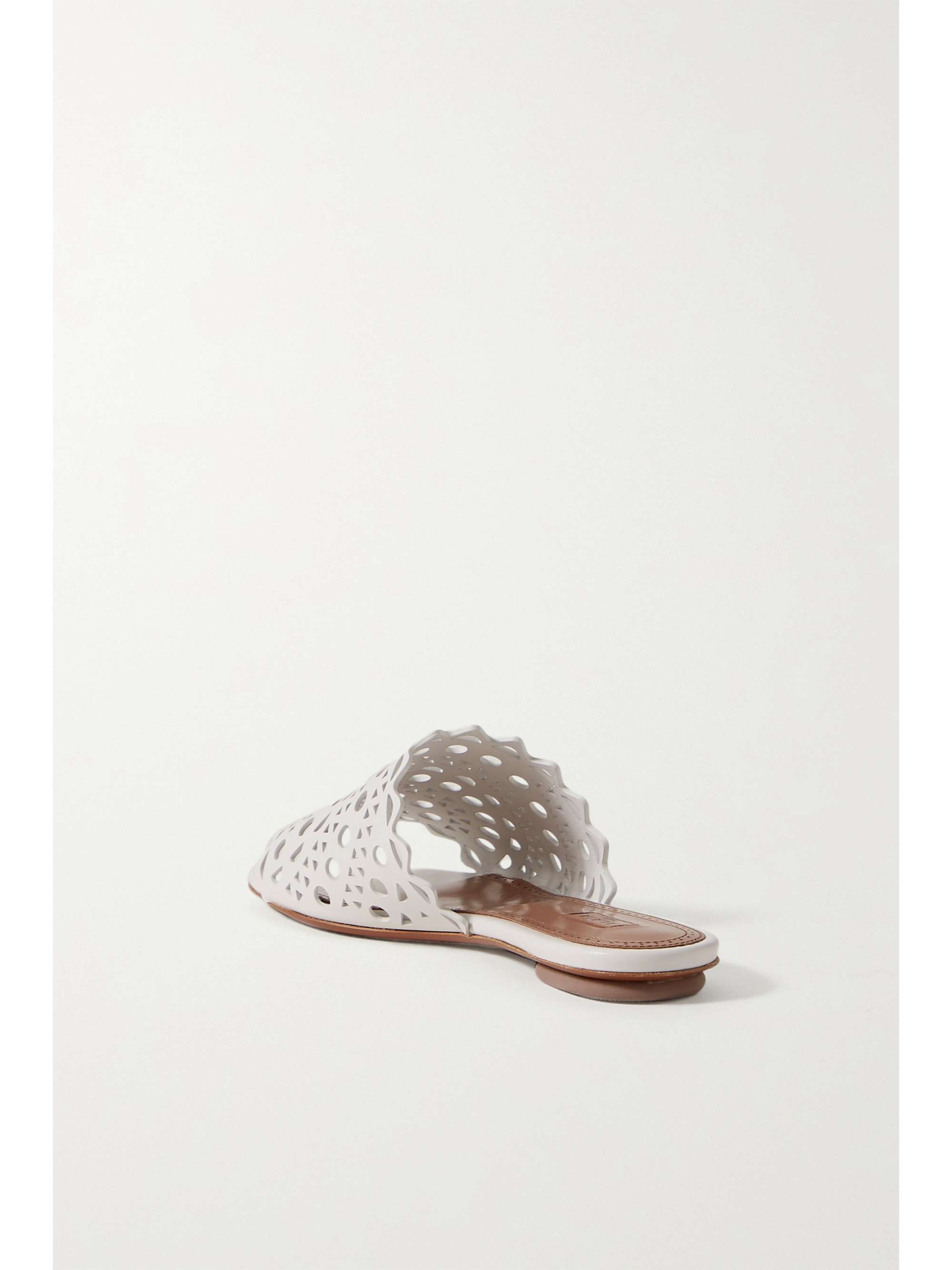White Laser-cut leather slides | ALAÃA | NET-A-PORTER