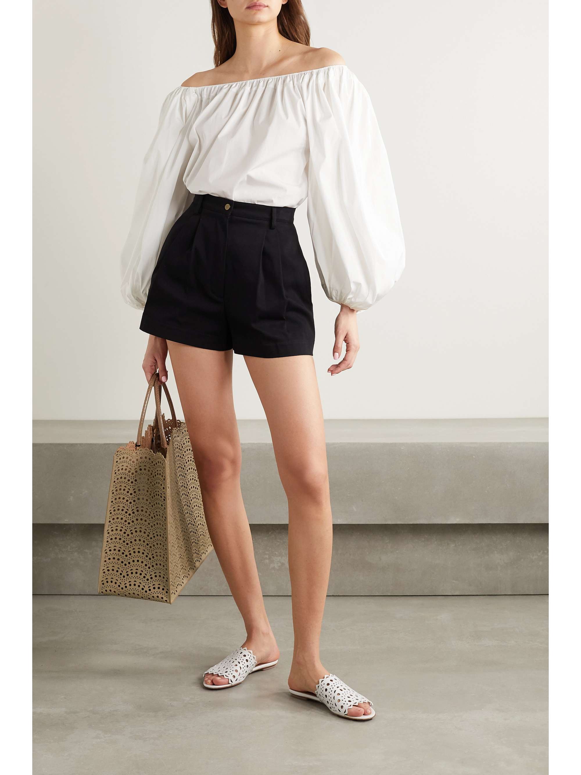 White Laser-cut leather slides | ALAÃA | NET-A-PORTER