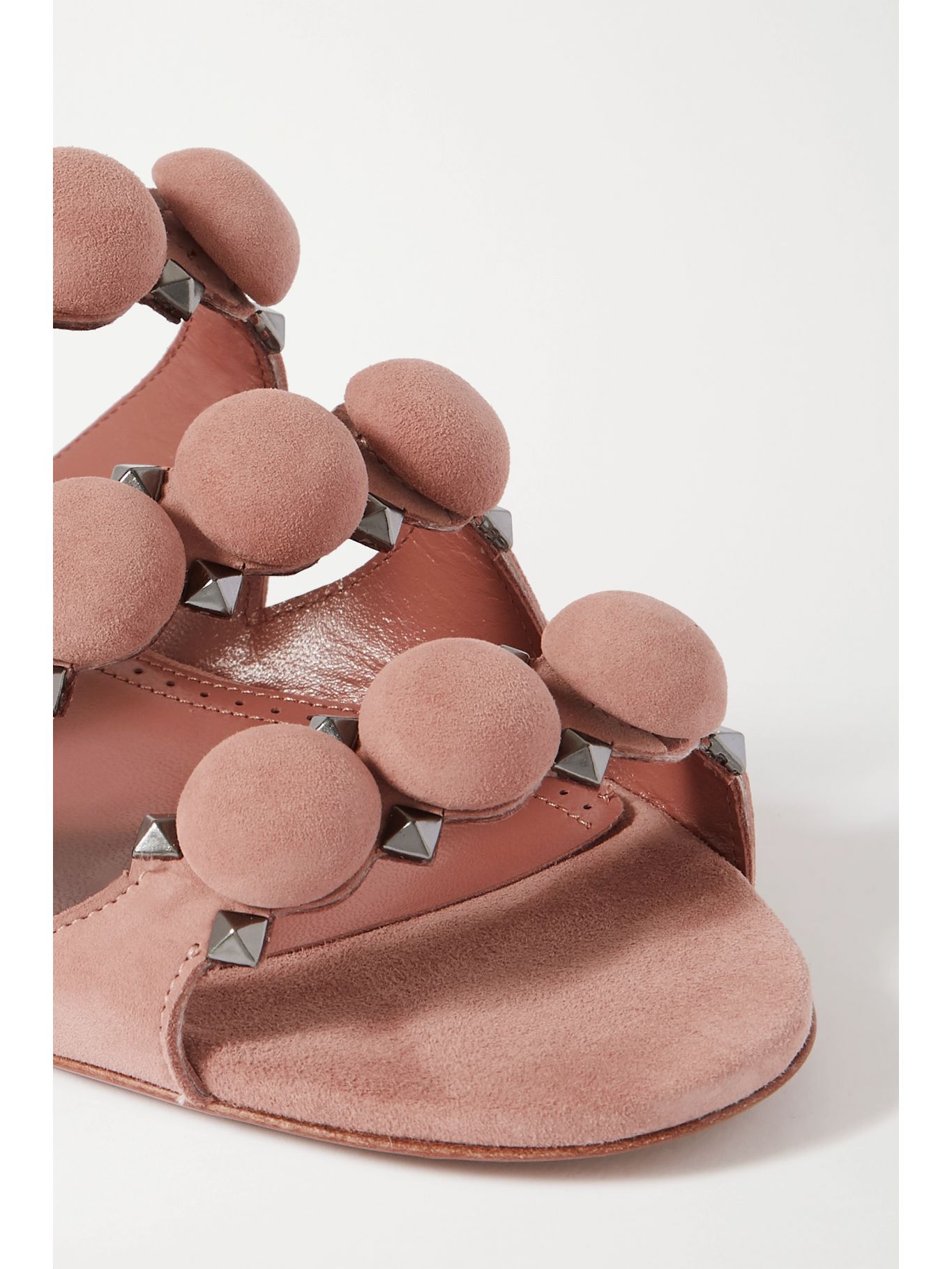 Neutral Bombe studded suede slides | ALAÃA | NET-A-PORTER